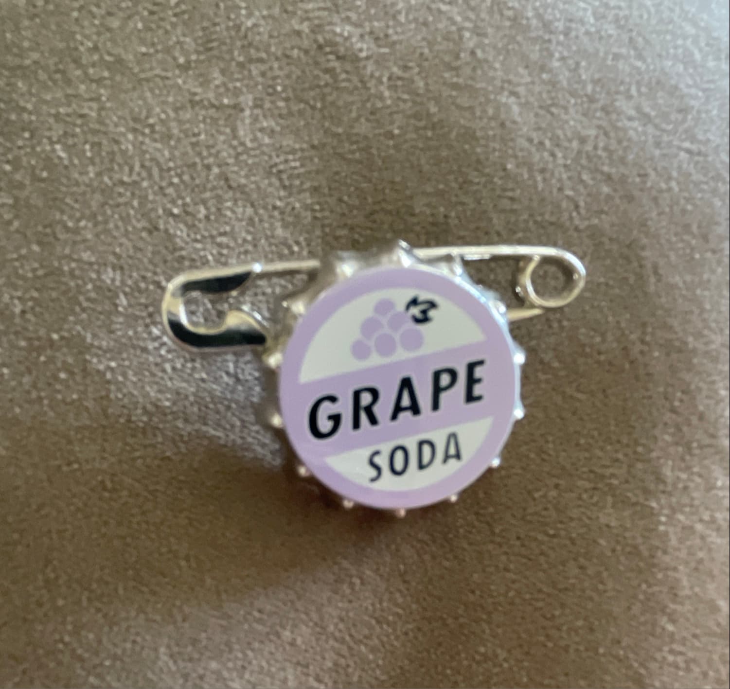 Grape Soda Bottlecap Pin - Up front