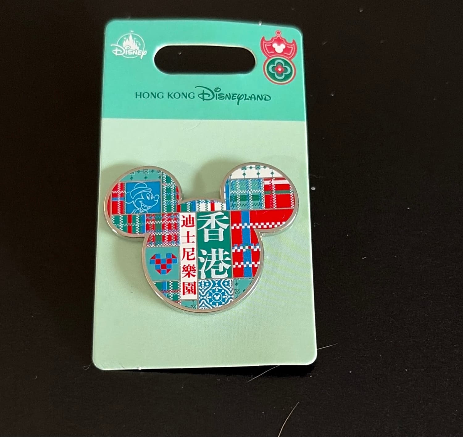 Mickey Head Icon with Plaid Pattern and Hong Kong Disneyland Chinese Text front