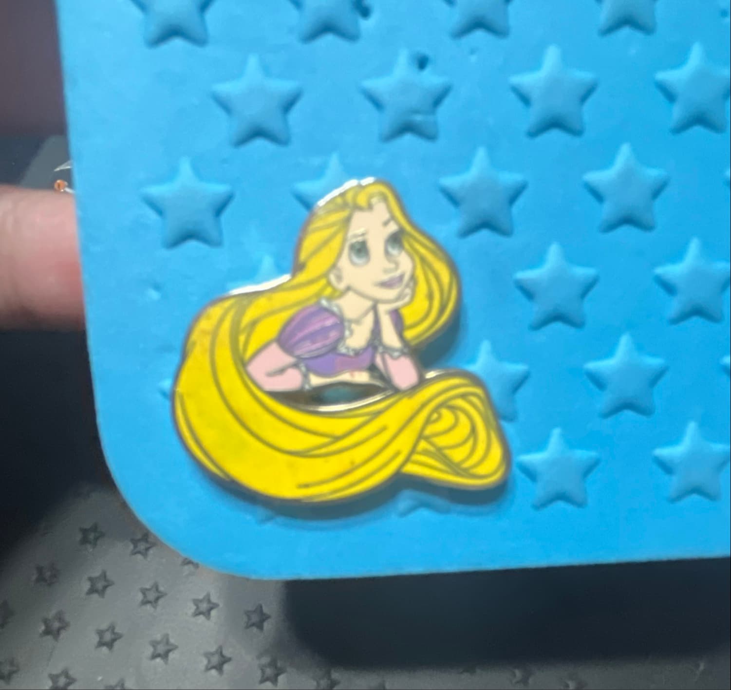 Rapunzel Leaning on Hand front