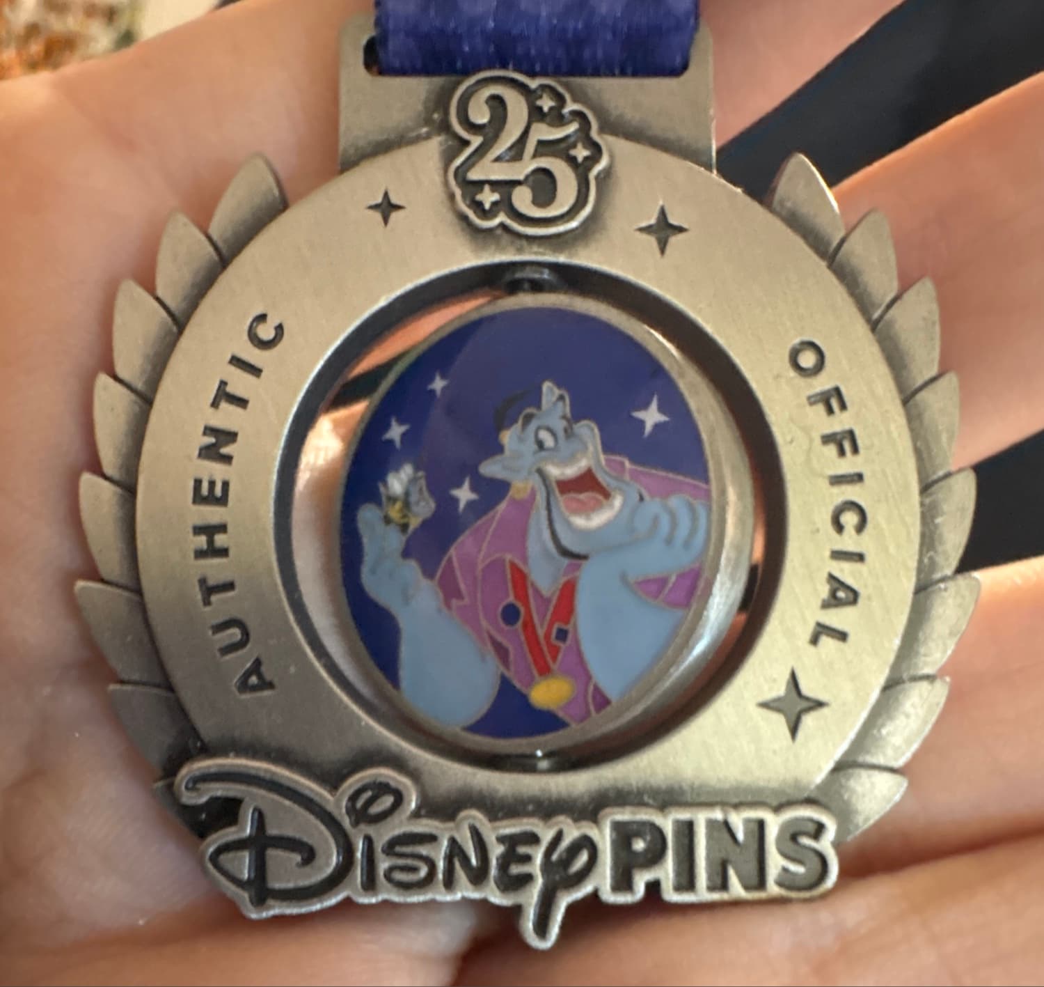Genie Character Collection 25th Anniversary Pin Trading Medal front