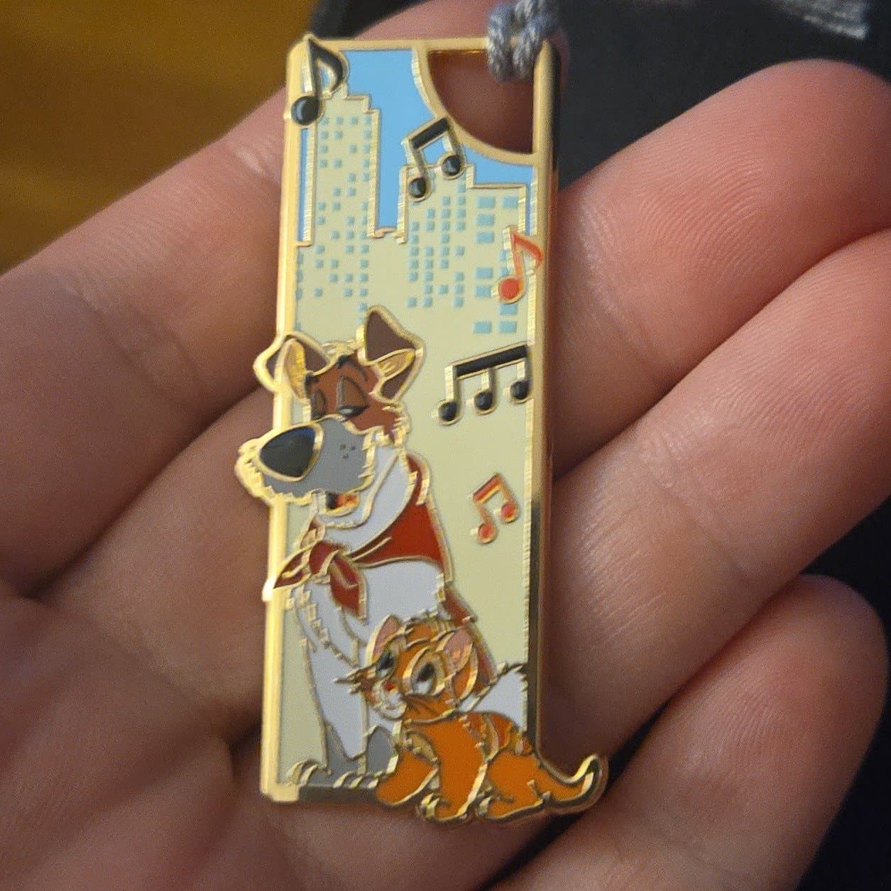 Oliver & Company Dodger and Oliver Musical Notes City Pin front