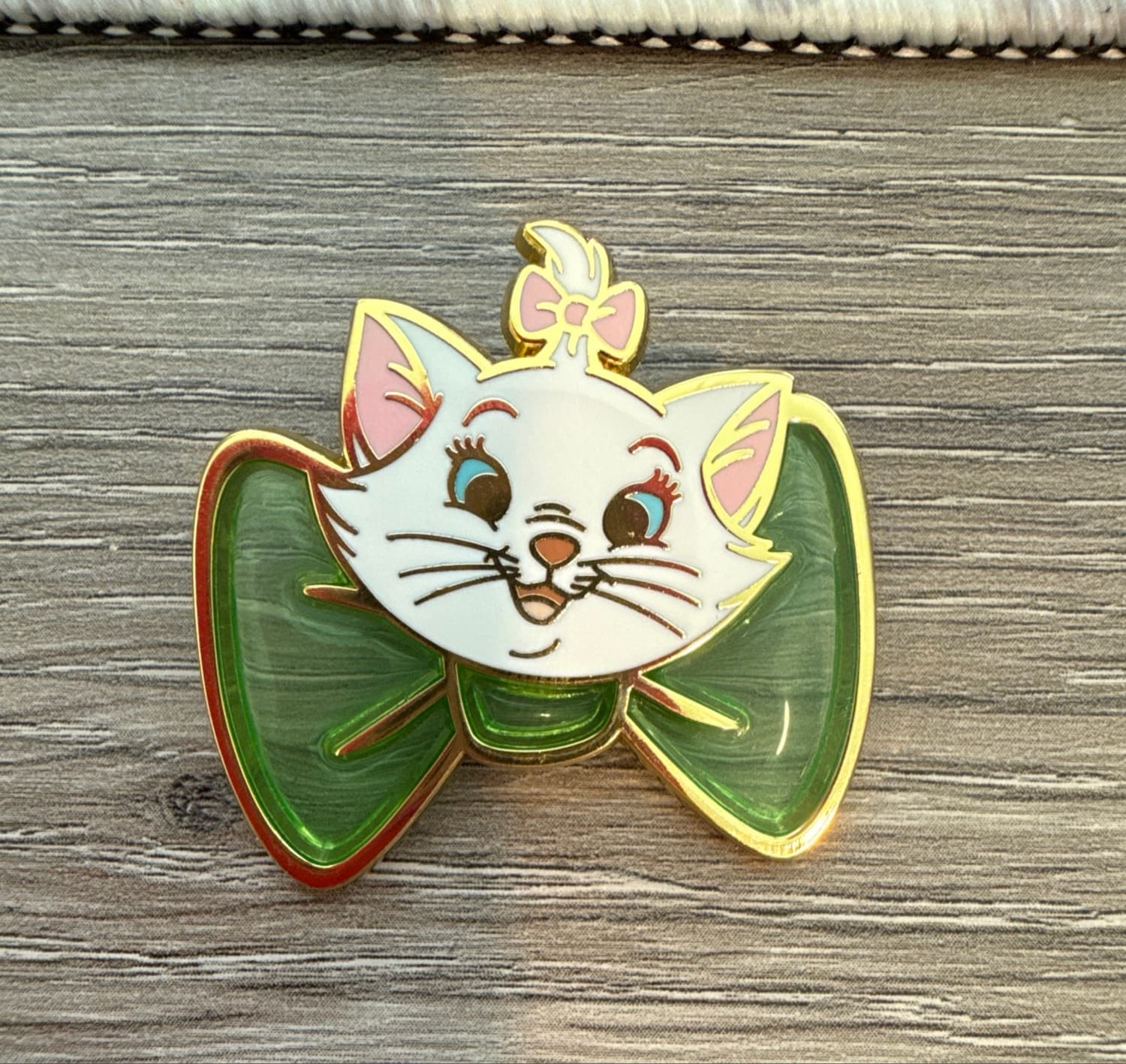 Marie Green Bow Pin front