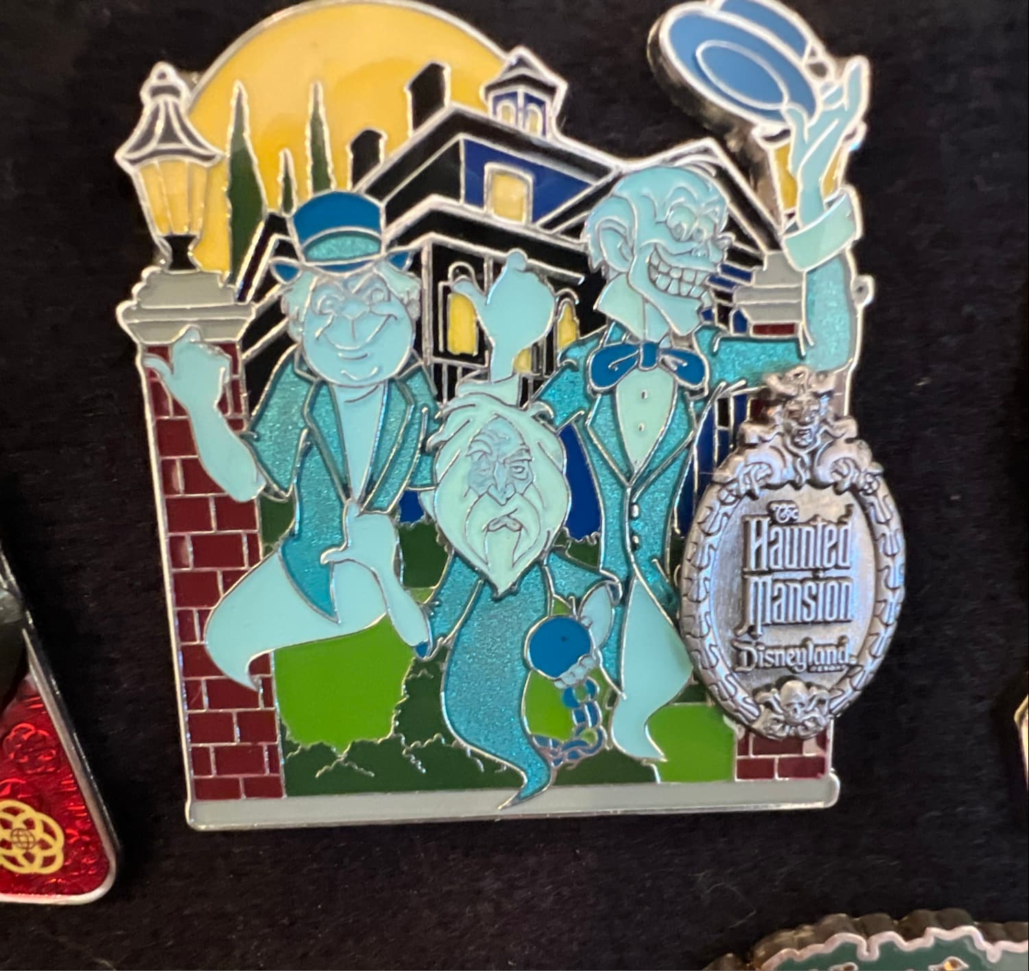The Haunted Mansion Hitchhiking Ghosts with Plaque front