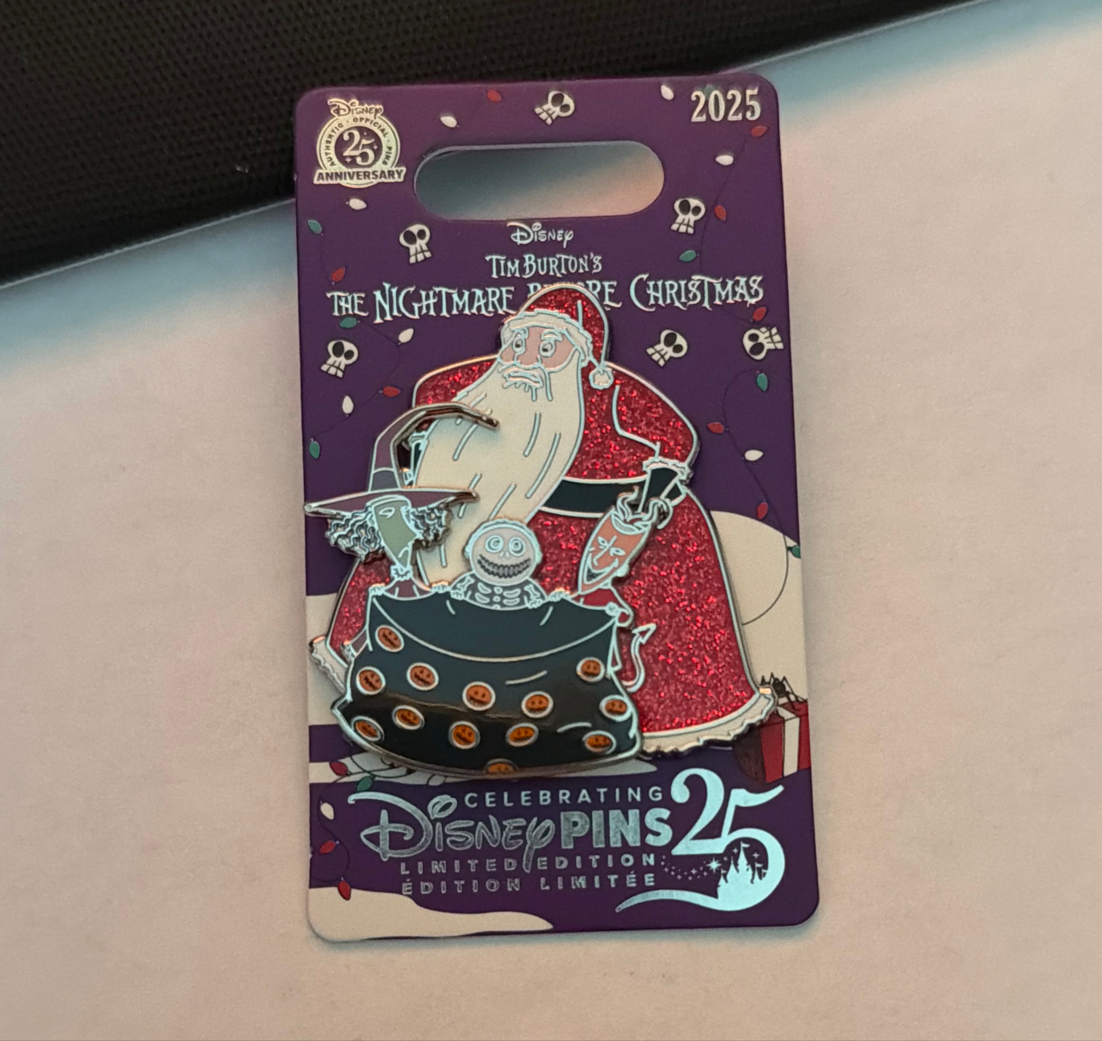 Santa holding Lock, Shock, & Barrel in Santa Bag - The Nightmare Before Christmas - Celebrating Disney Pins 25 front