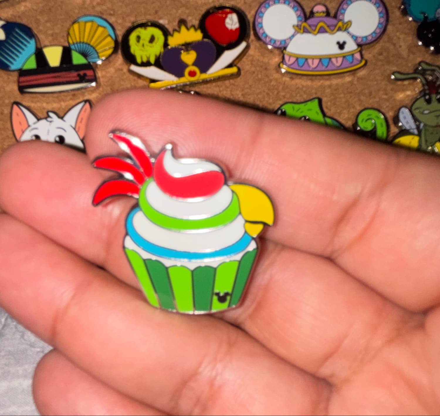 Disney Cupcakes Pin - Tiki Bird Chaser front
