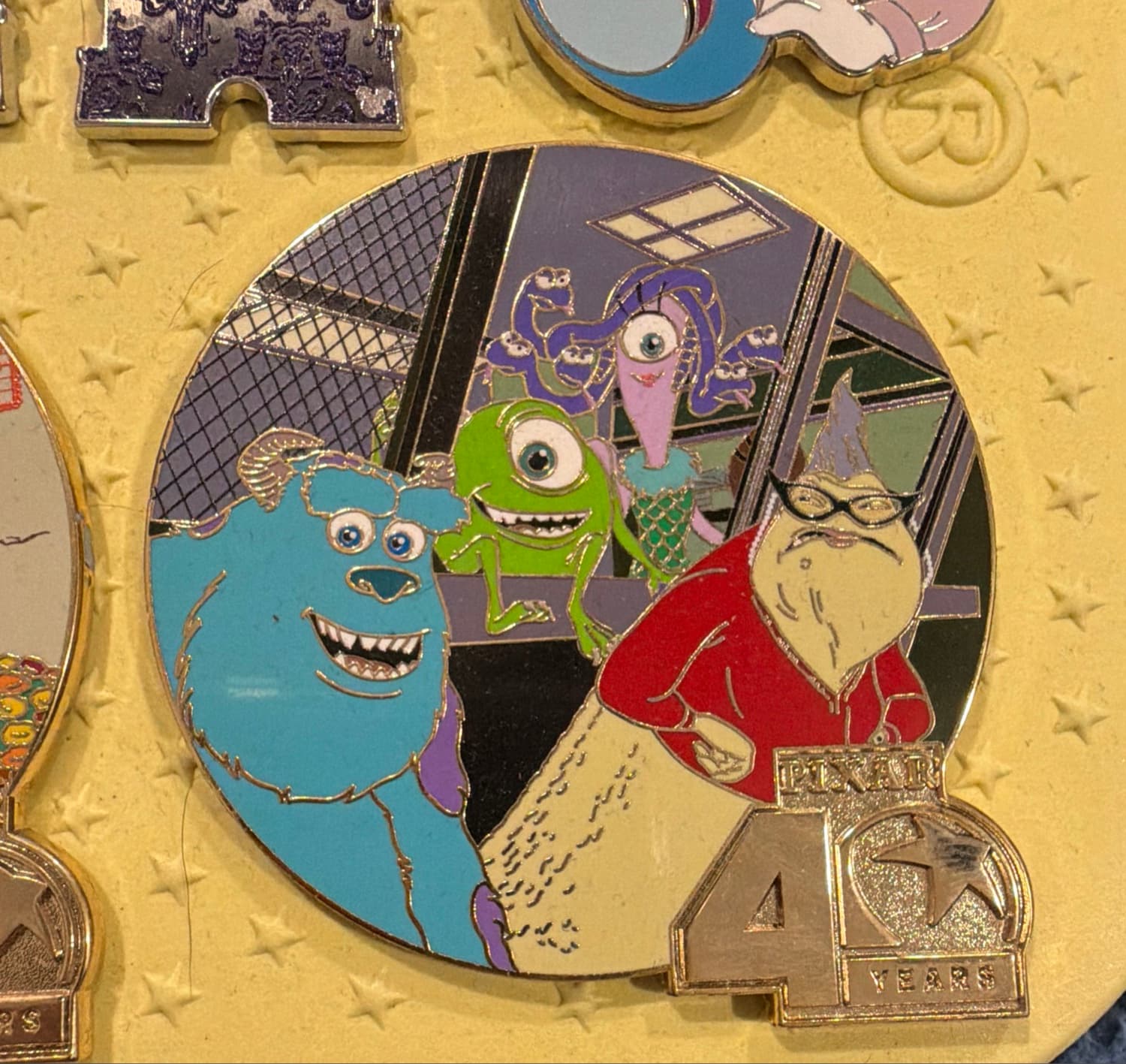 Monsters, Inc. Cast with Pixar 4 Years Logo Pin front