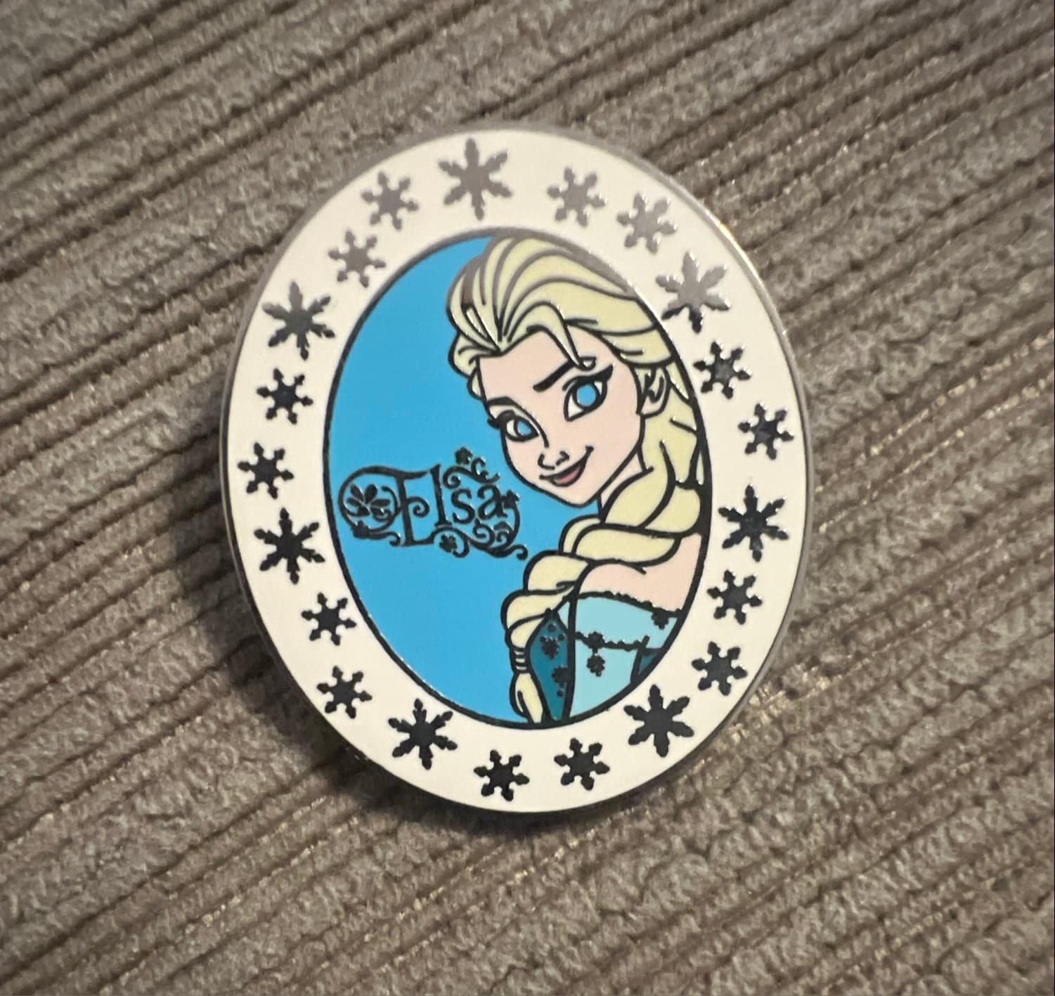 Elsa Snowflakes Oval Pin front