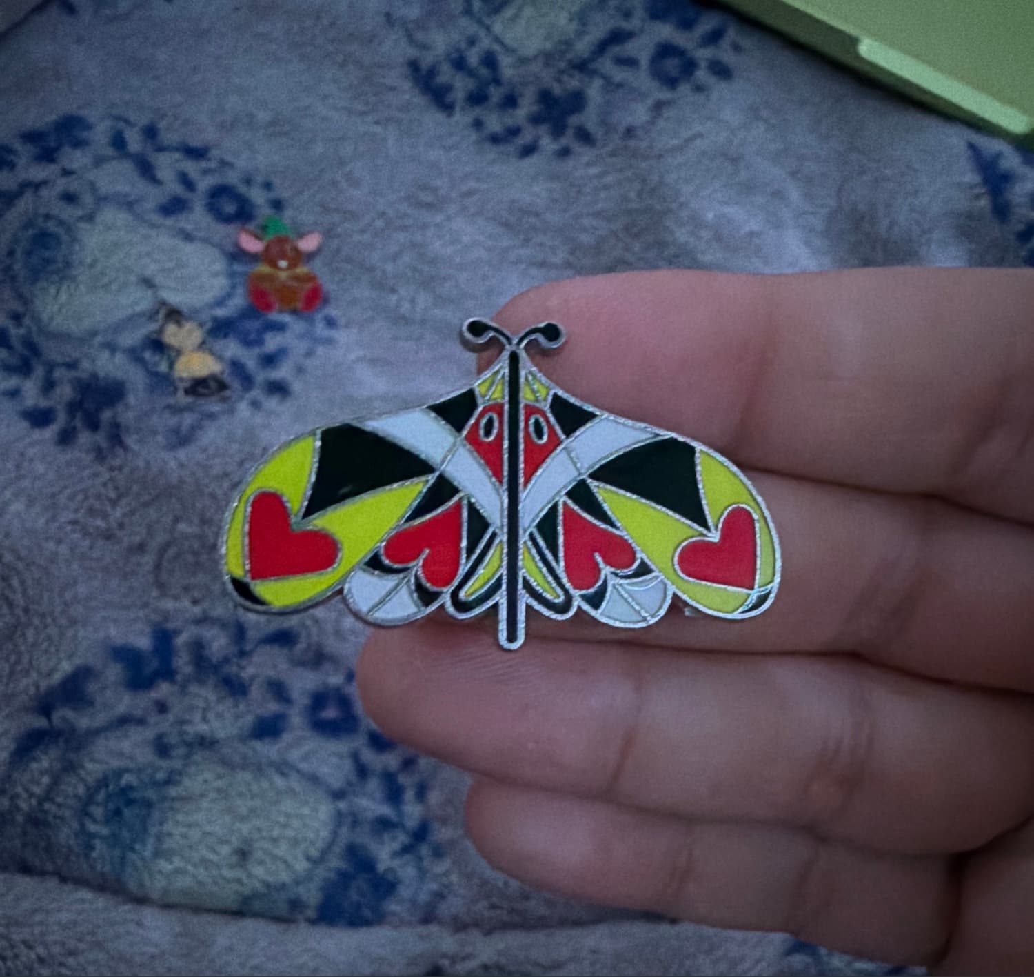 Queen of Hearts butterfly pin front
