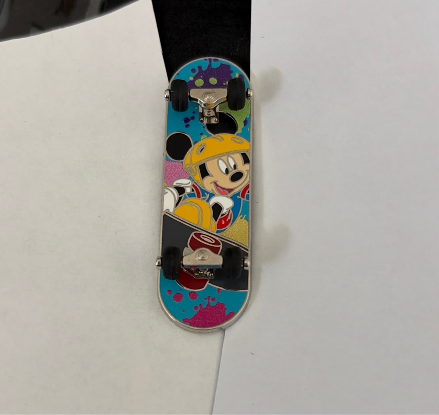 Mickey Mouse Paint Splatter Skateboard front
