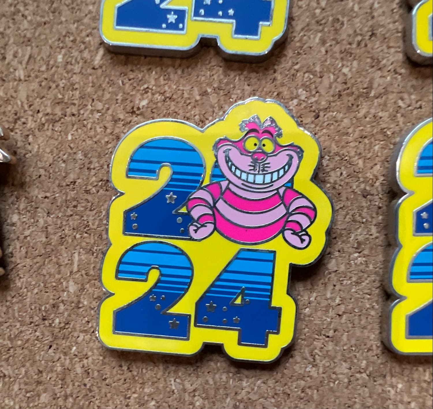 Disney 2024 Dated Booster Pin - Cheshire Cat front