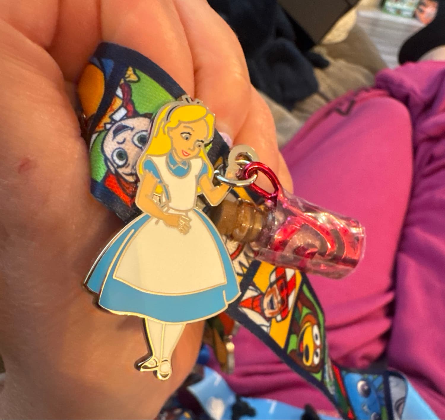Alice with Shrink Me Glitter Bottle Pin front