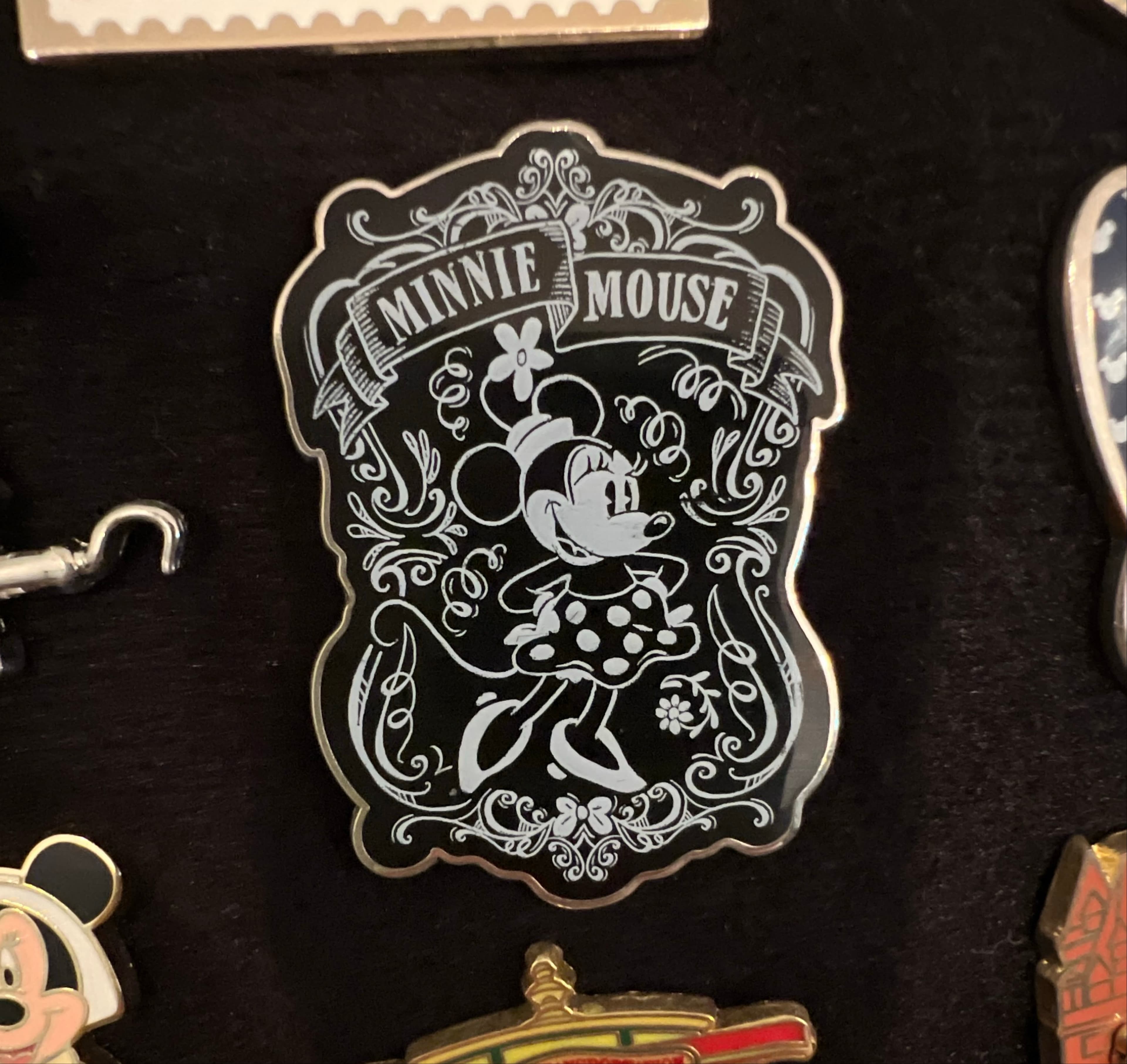 Minnie Mouse Black and White Ornate Shield with Banner Pin front