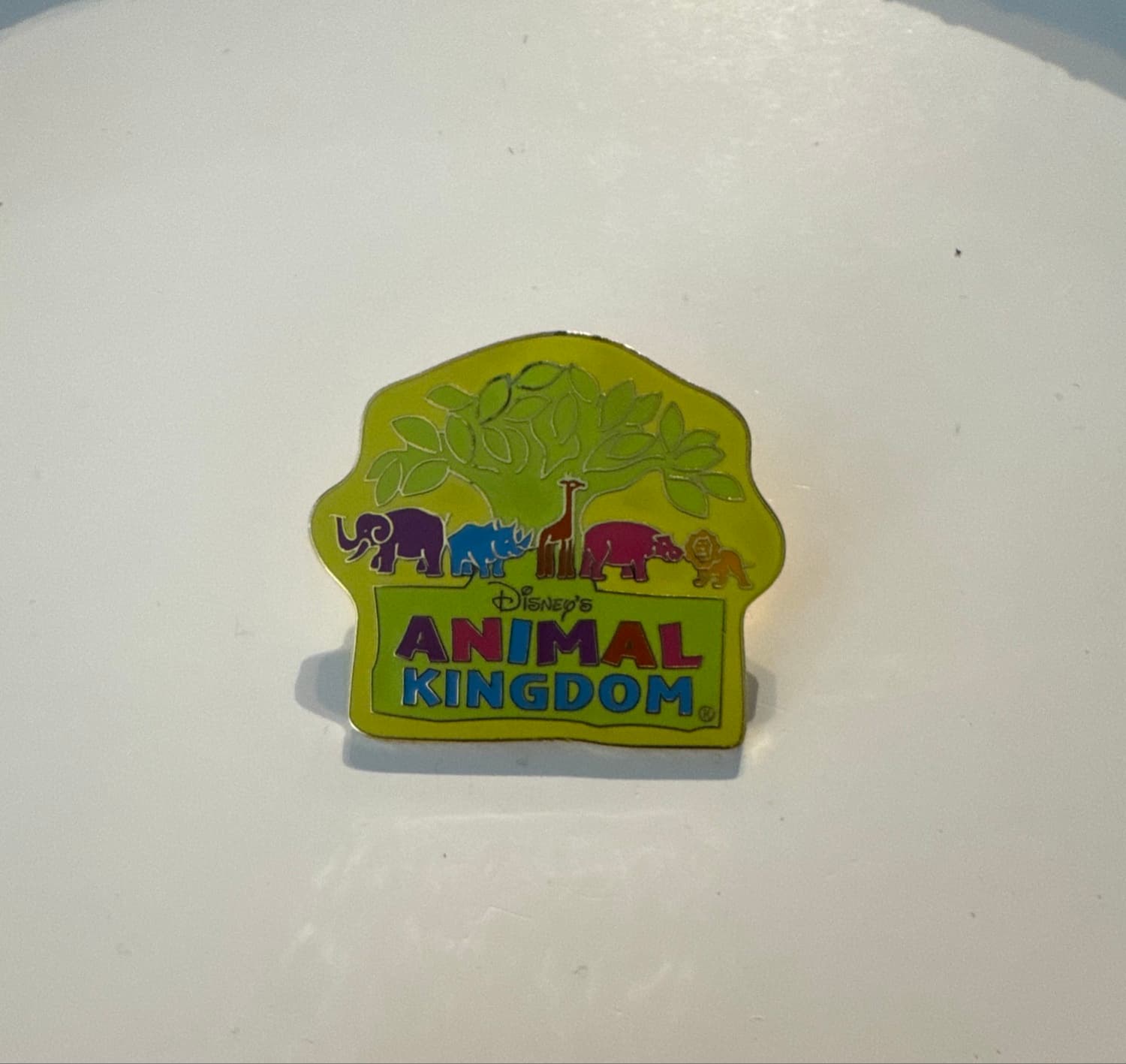 Disney Animal Kingdom Pin Whimsical Logo Elephant Giraffe Lion Pin front