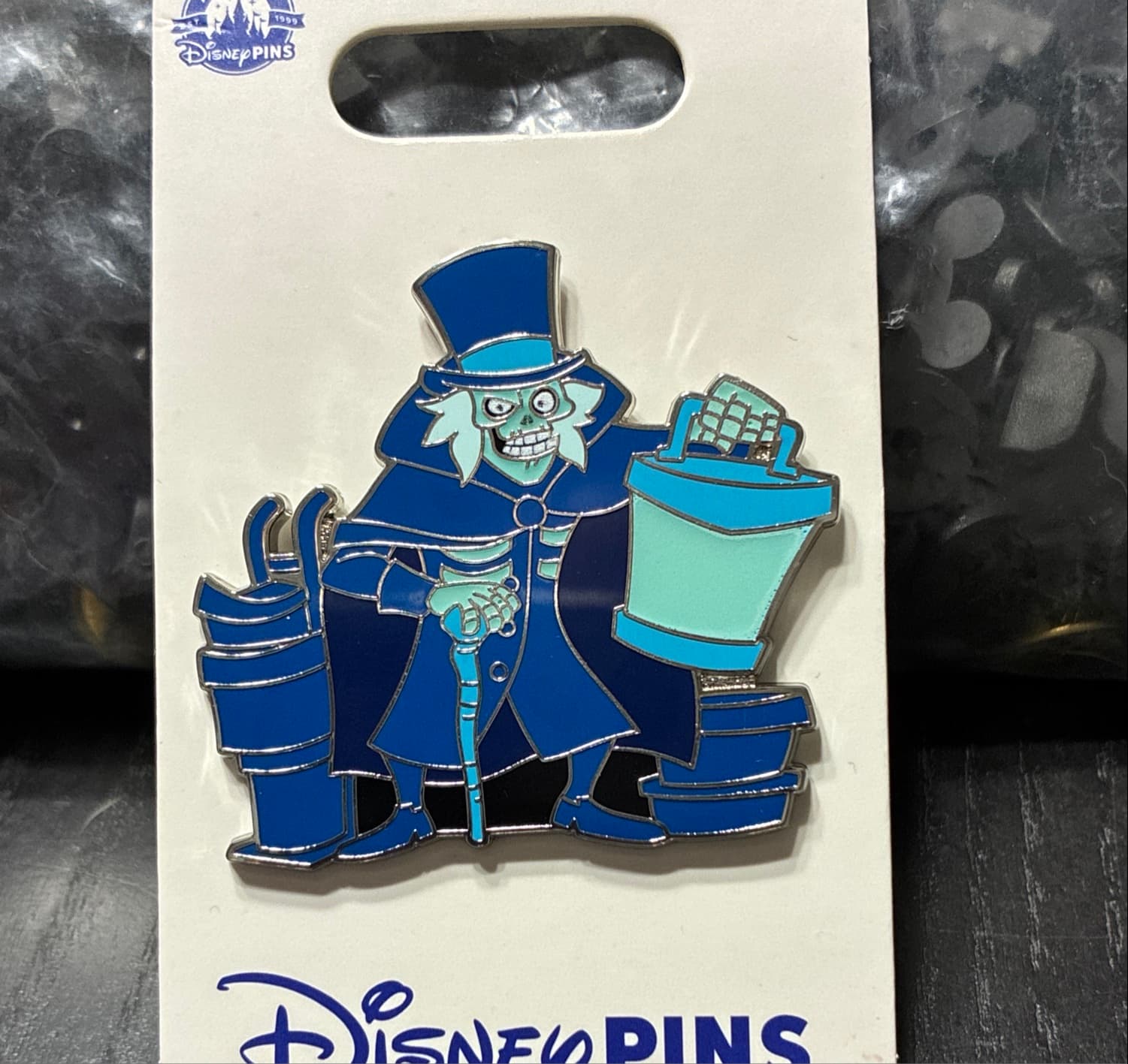 Hatbox Ghost Pin - The Haunted Mansion front