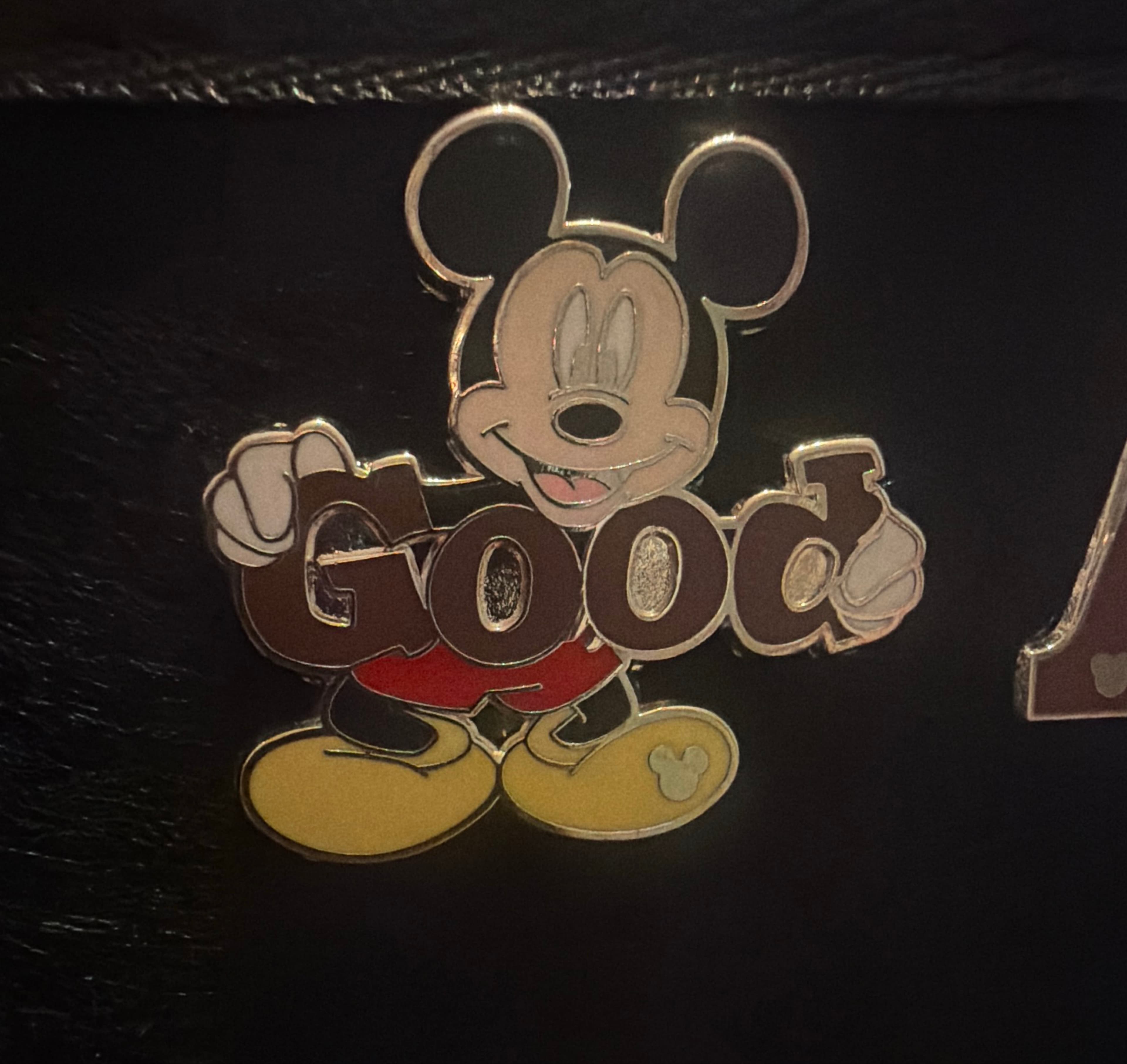 Mickey Mouse Holding Good front