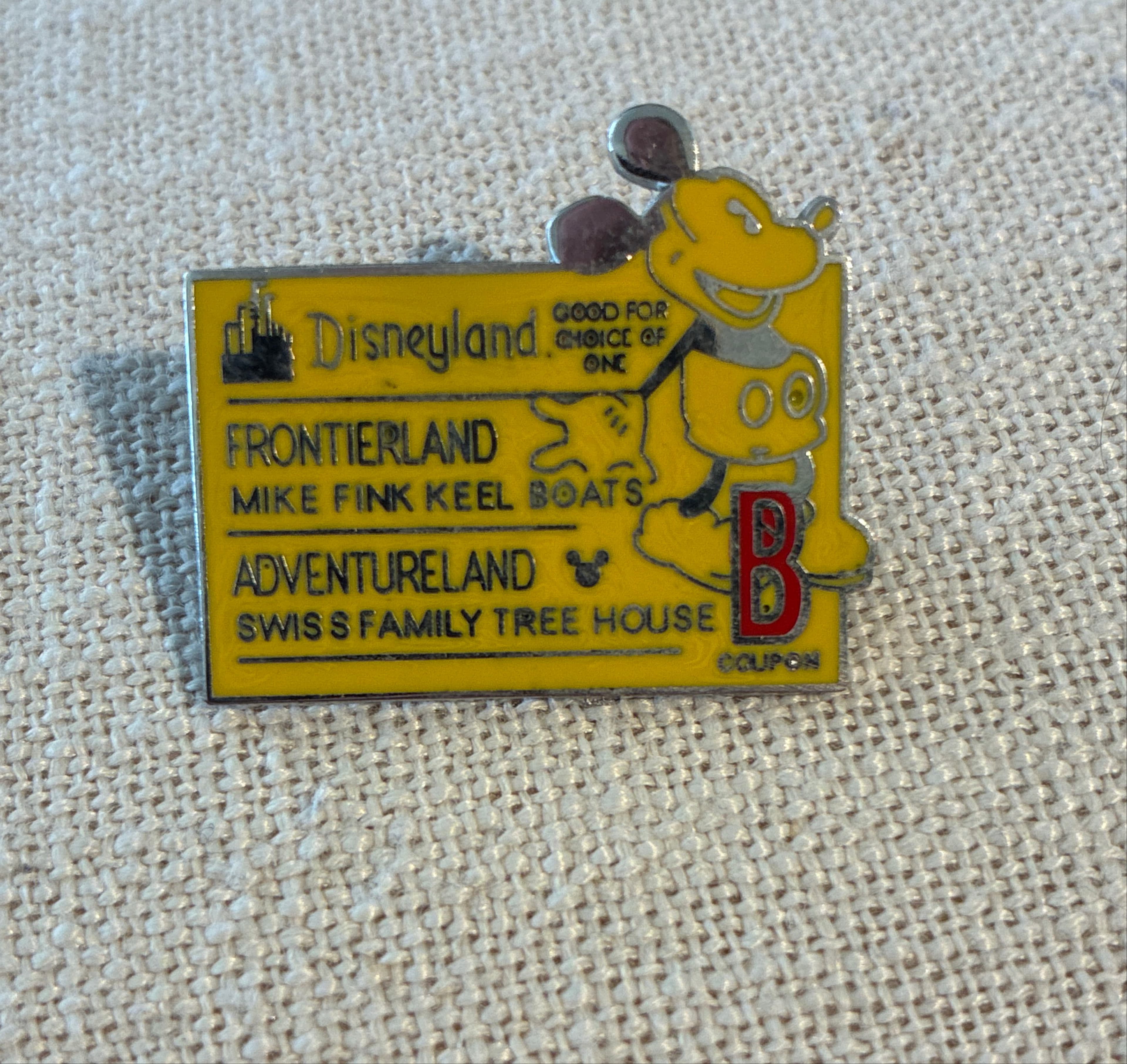 Mickey Mouse "B" Frontierland / Adventureland Ticket Pin front