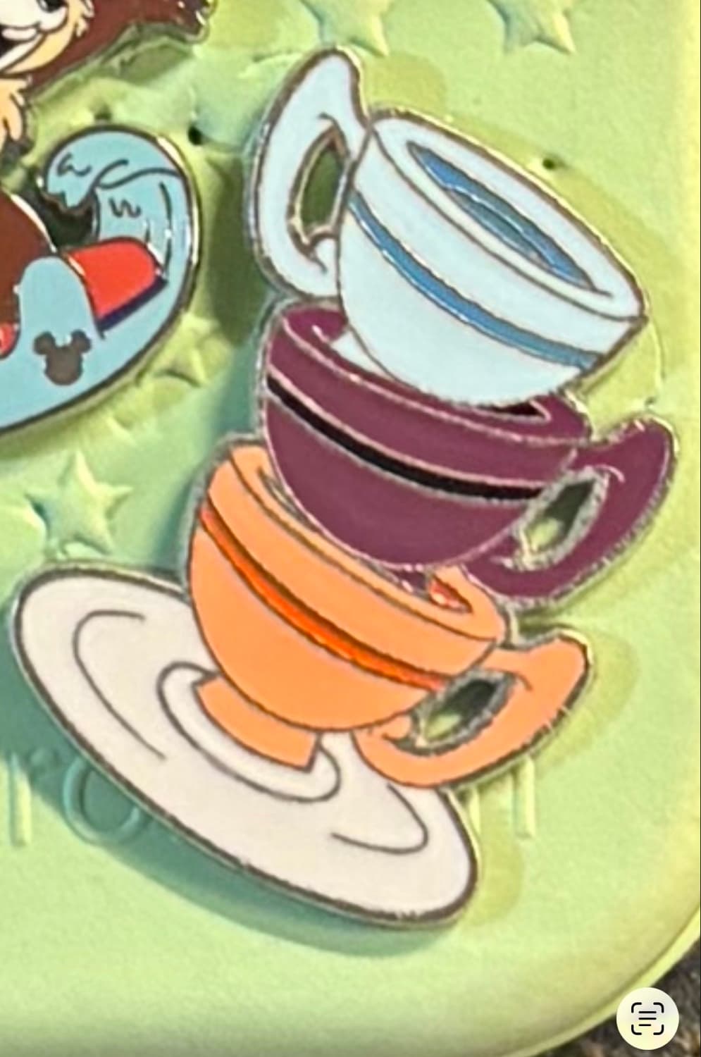 Mad Tea Party Stacked Teacups Pin front