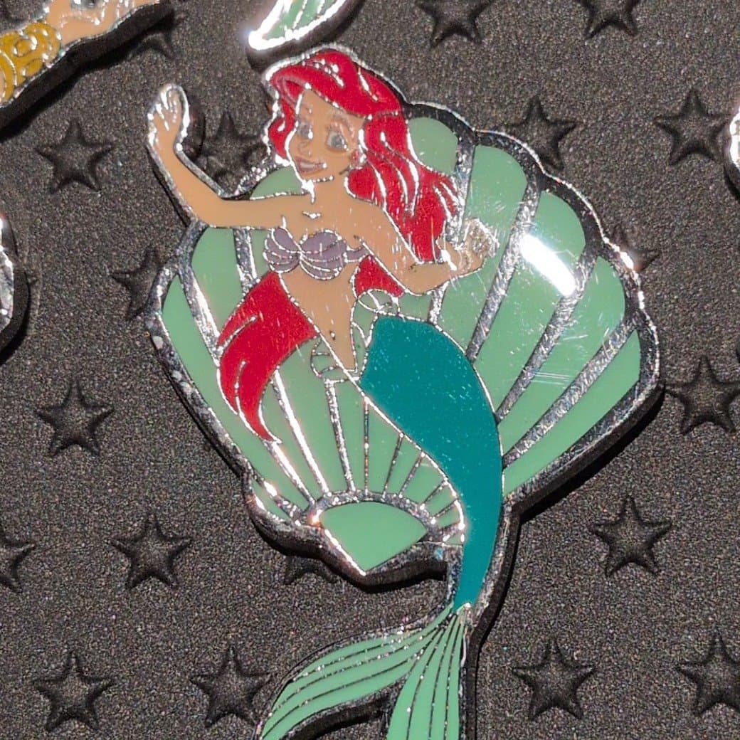 The Little Mermaid Ariel Swimming Shell Frame Enamel Pin front