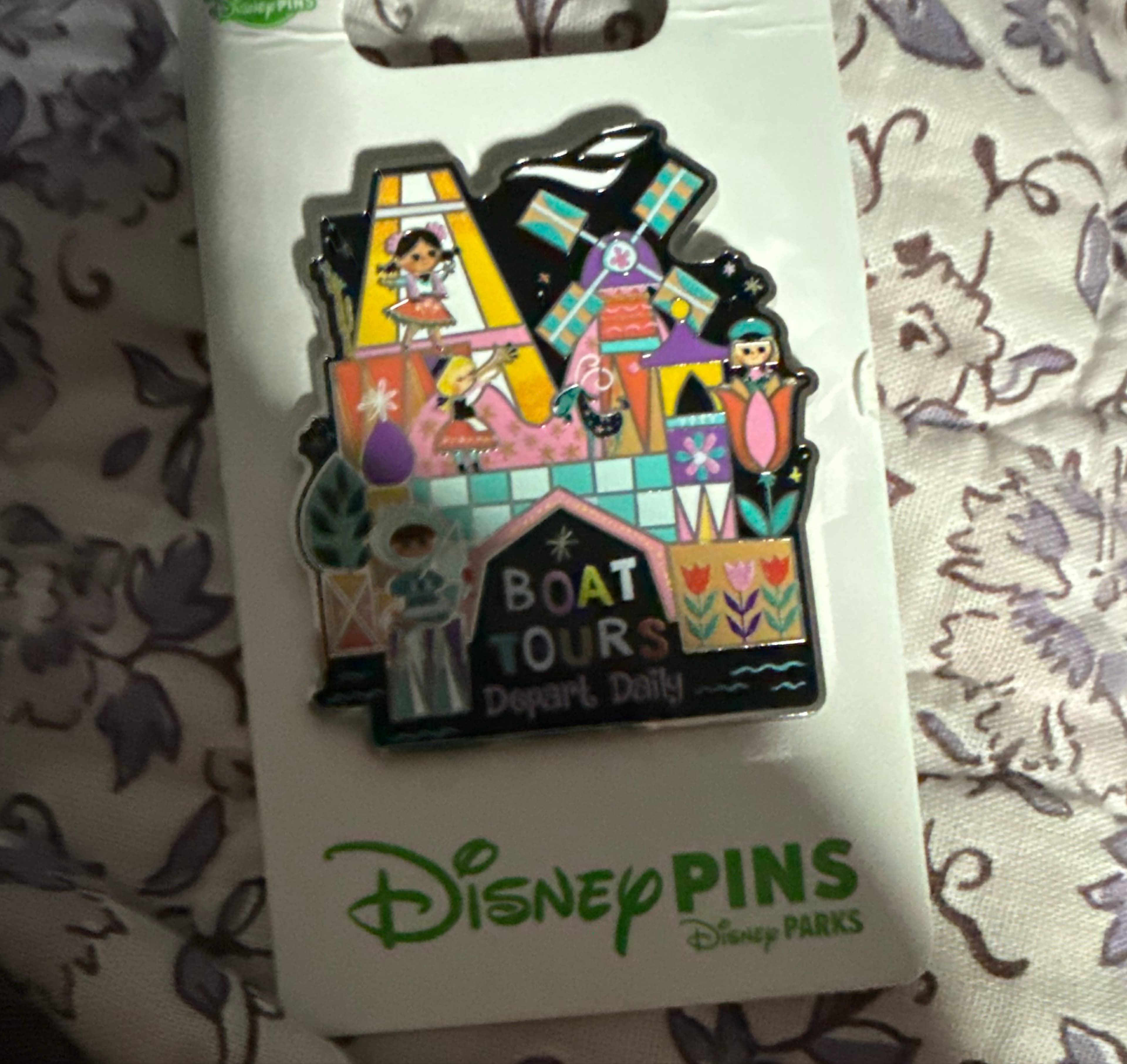 Disney it's a small world Boat Tours Depart Daily Pin front