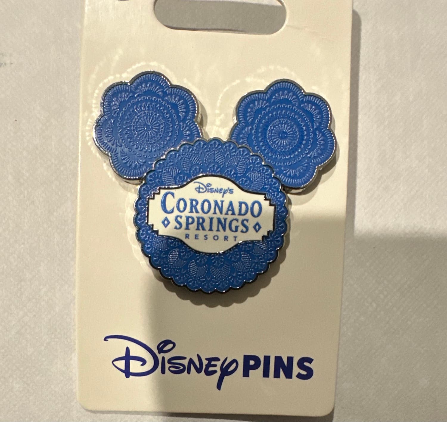 Disney's Coronado Springs Resort - Blue Mickey Head Logos front