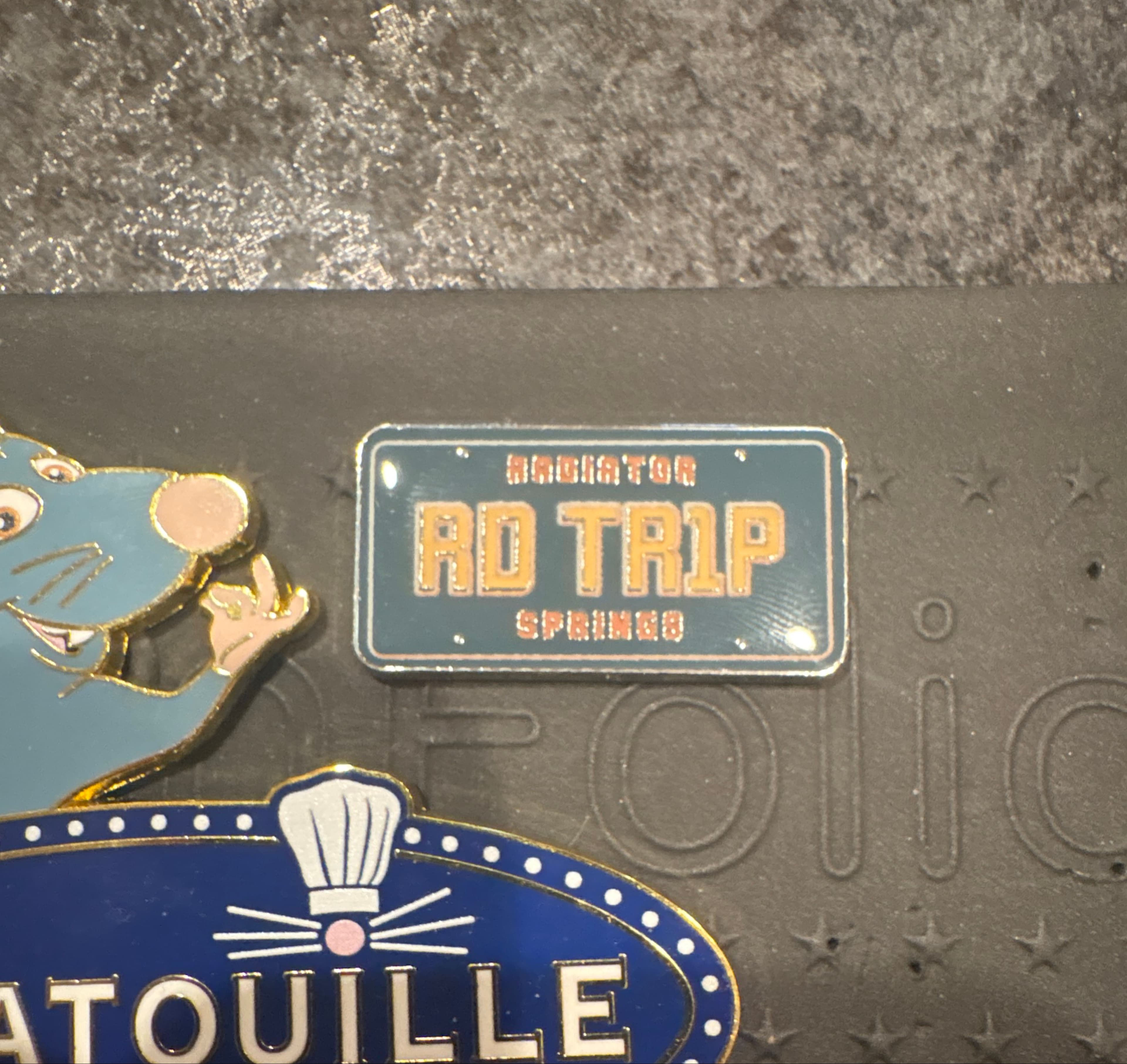 Radiator Springs Road Trip License Plate Pin front