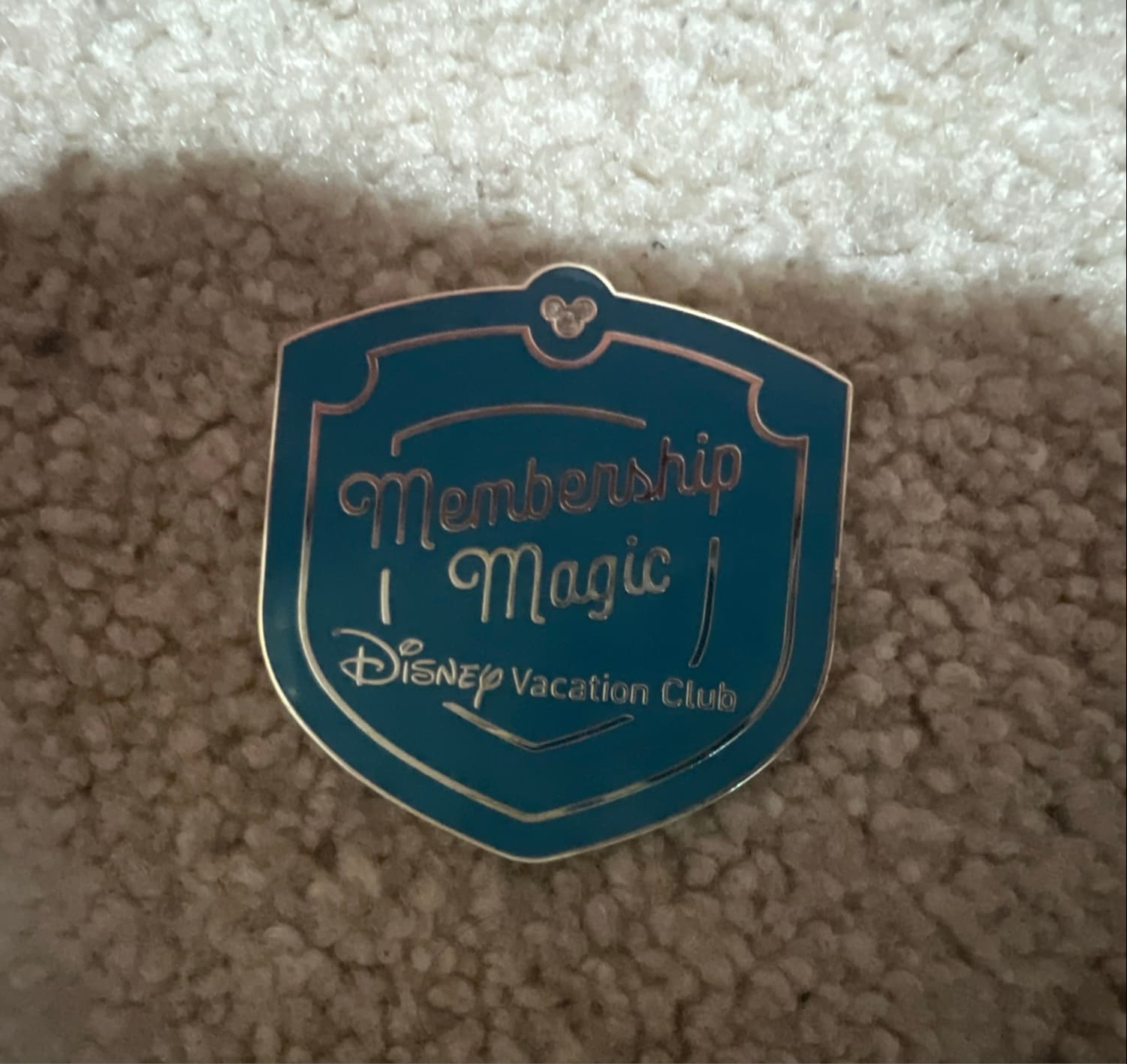 Disney Vacation Club Membership Magic Teal Shield Pin front
