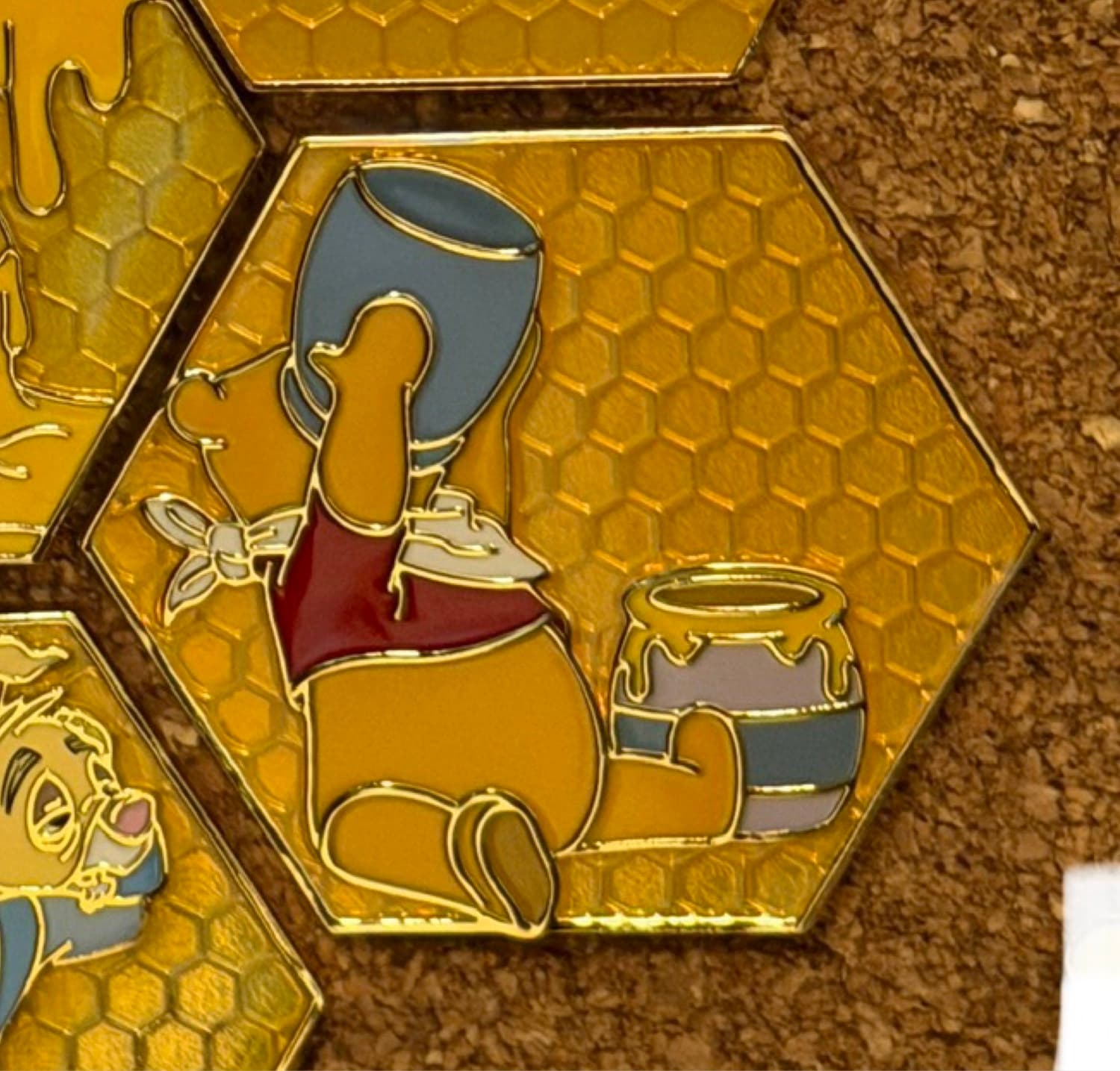 Winnie the Pooh Drinking Honey Honeycomb Pin front