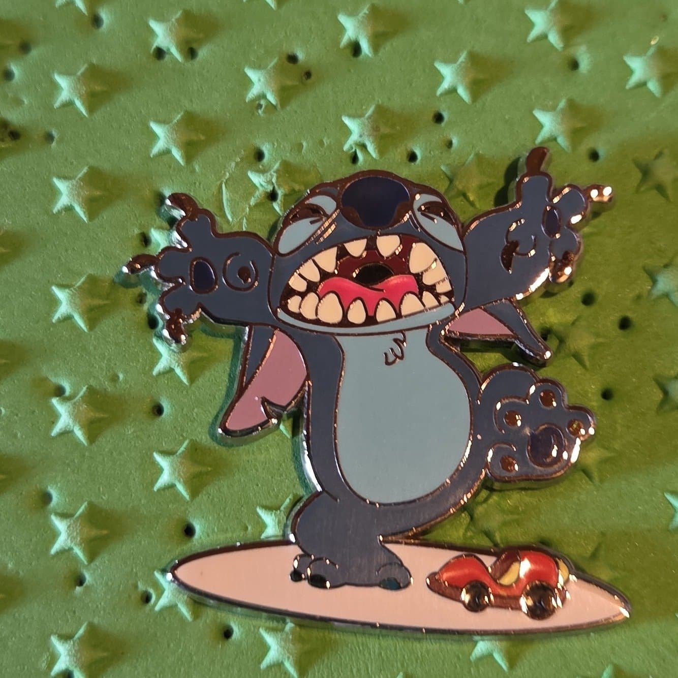 Stitch as Godzilla with Car on Surfboard front