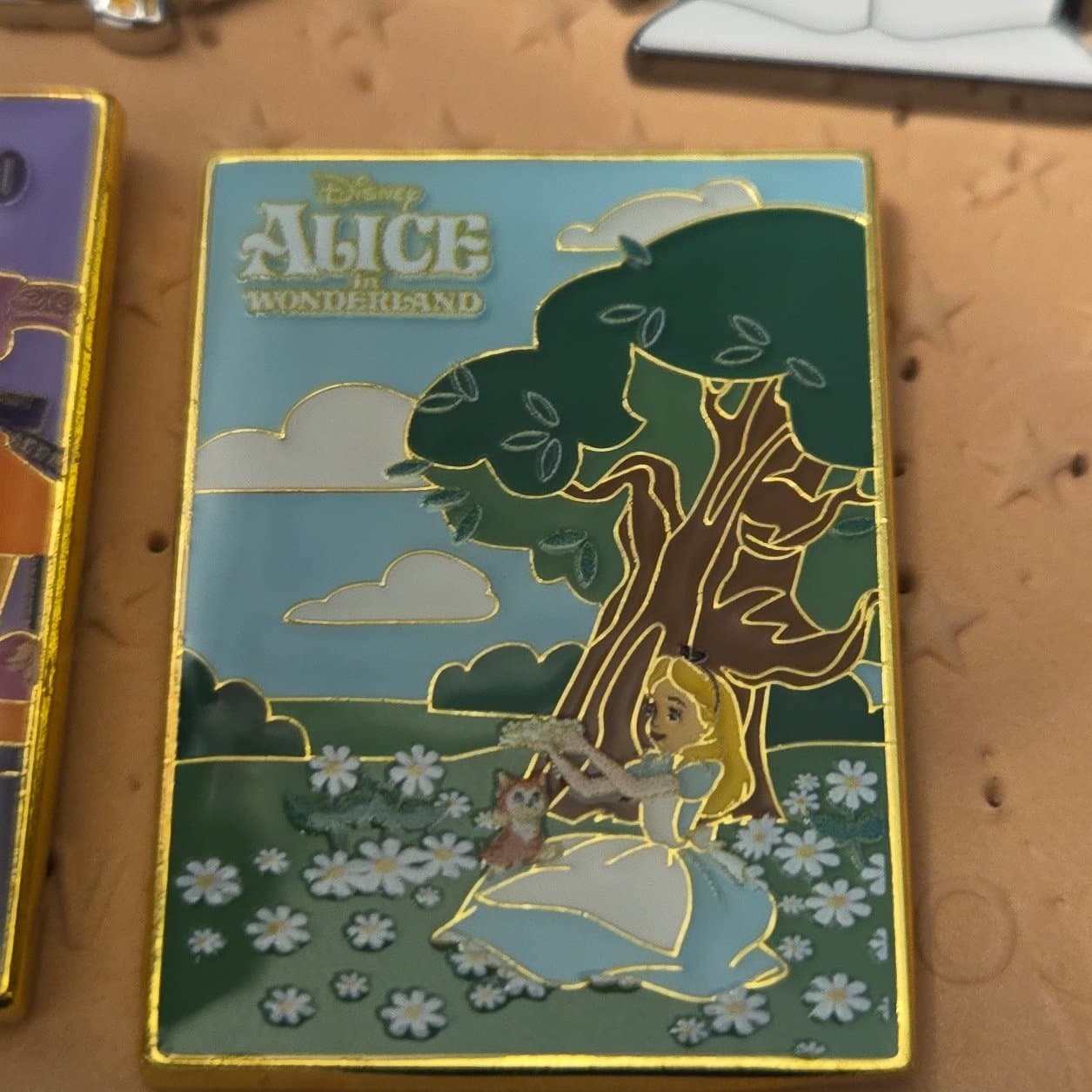 Disney Alice in Wonderland Floral Scene Enamel Pin front
