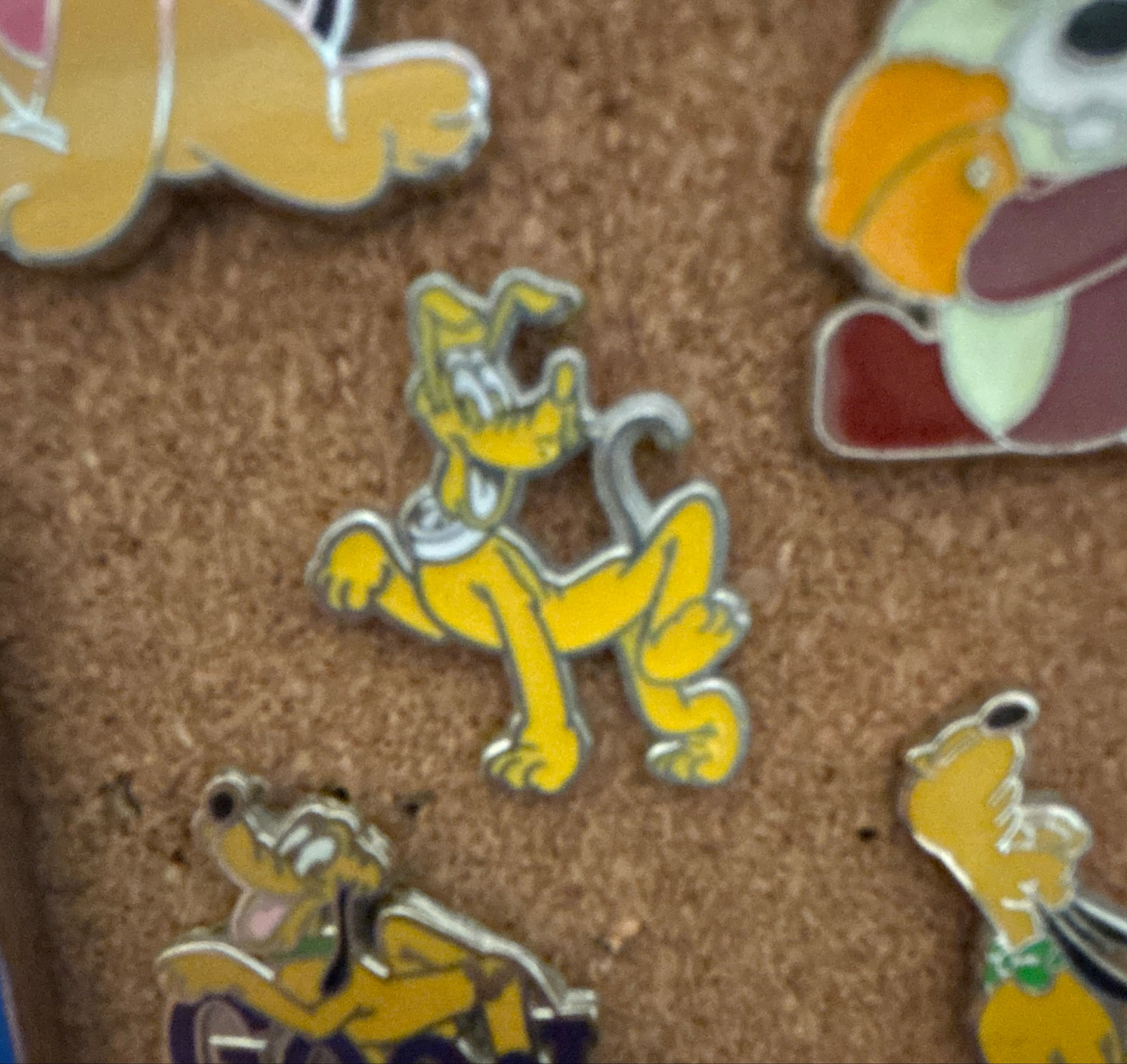 Pluto Standing with Raised Paw Pin front