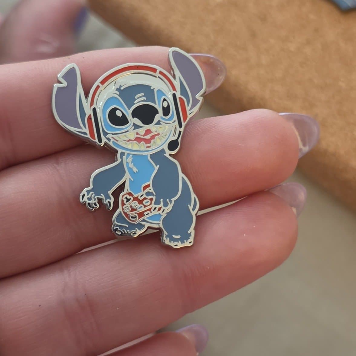 Stitch with Headphones & Controller front