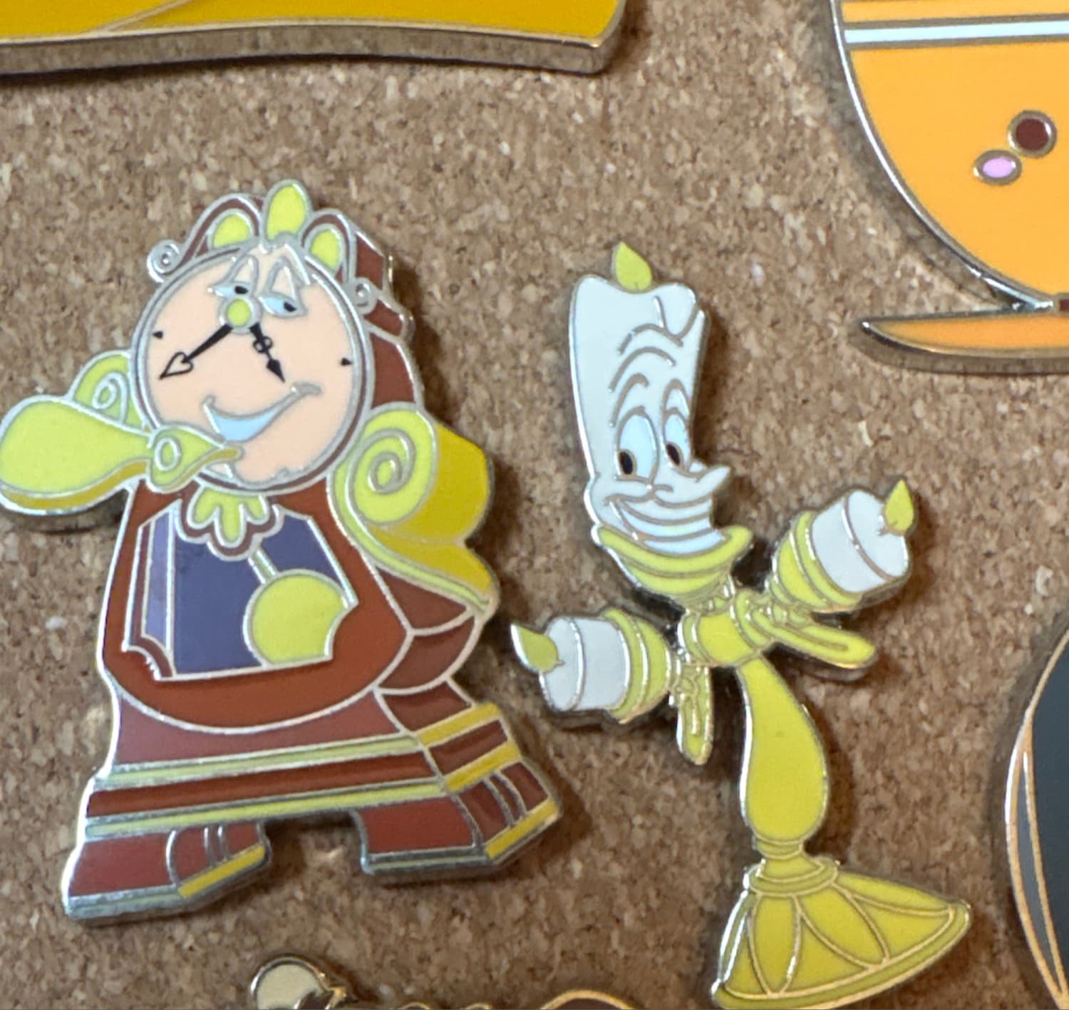 Cogsworth & Lumiere front