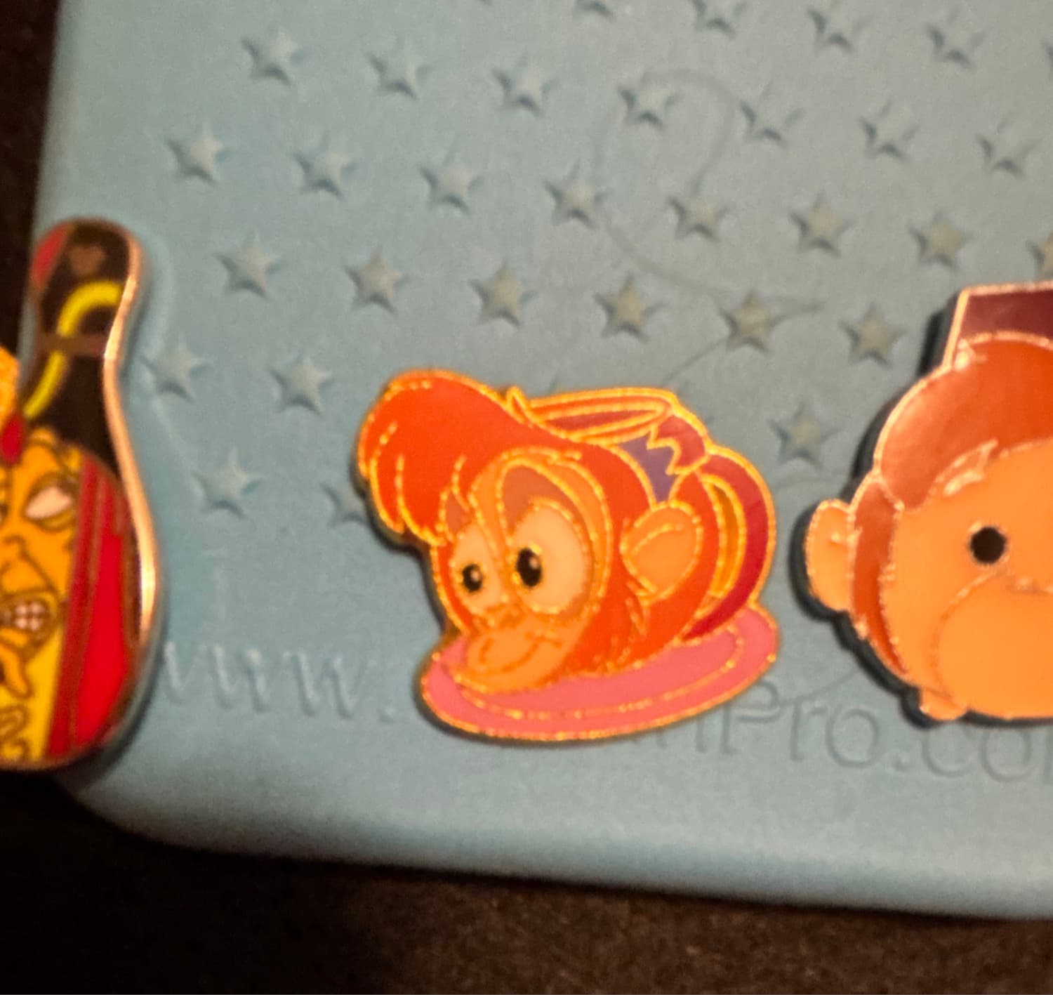 Abu Headshot with Pink Base Pin front