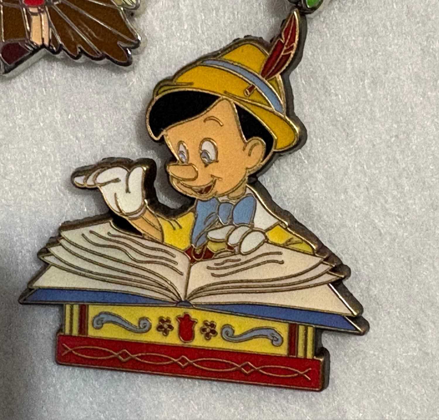 Loungefly Pinocchio Storybook Pin front