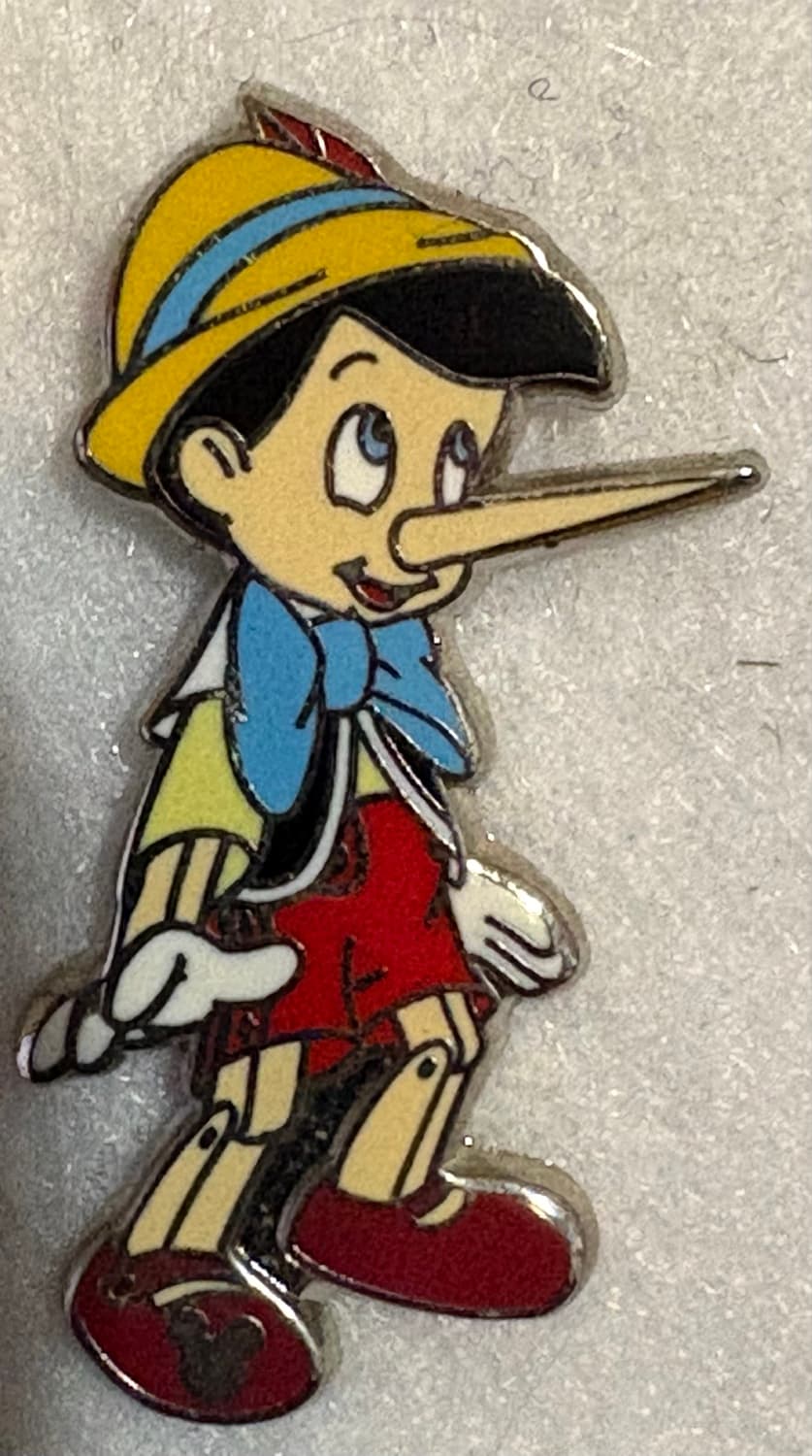 Pinocchio Completer Pin front