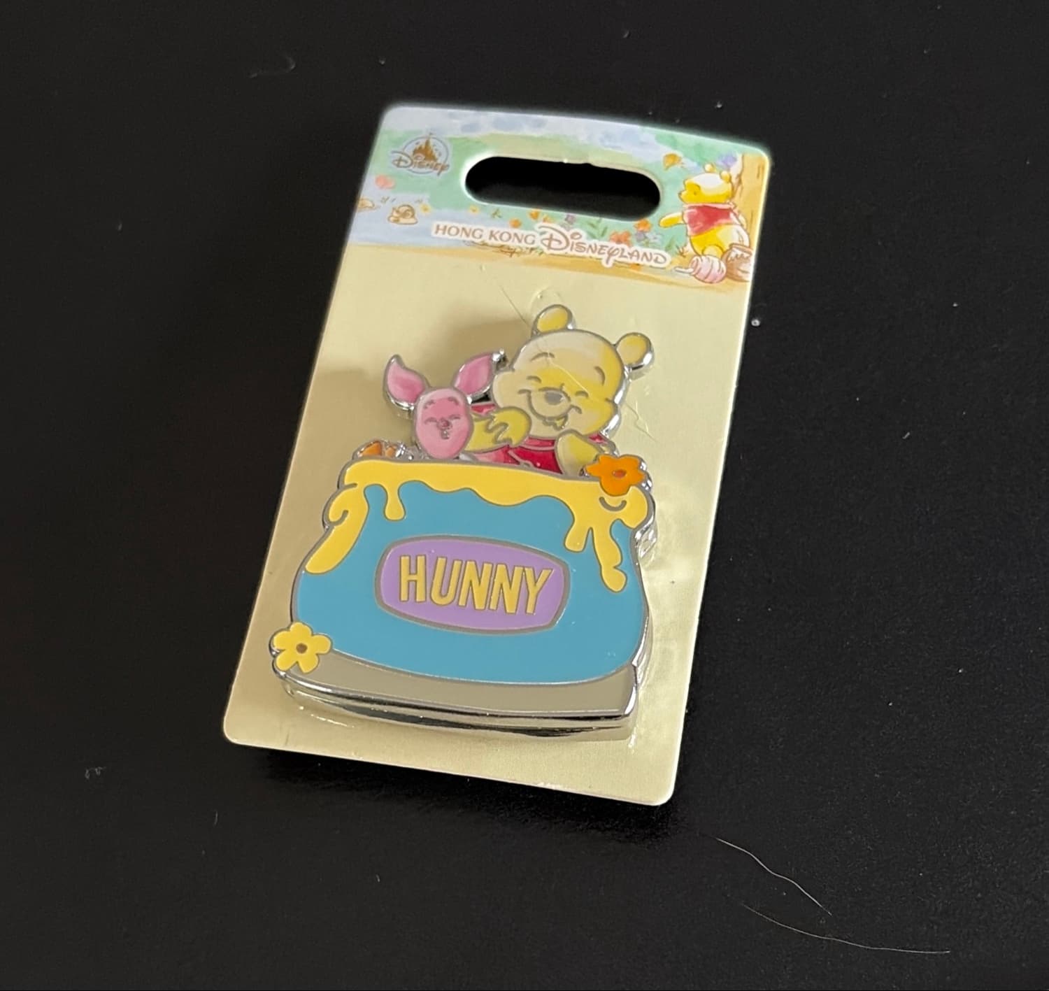 Winnie the Pooh and Piglet in Hunny Pot front