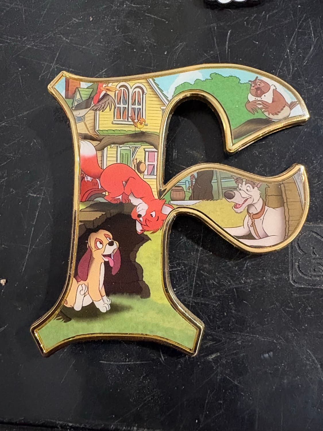 F for fox and the hound fantasy pin front