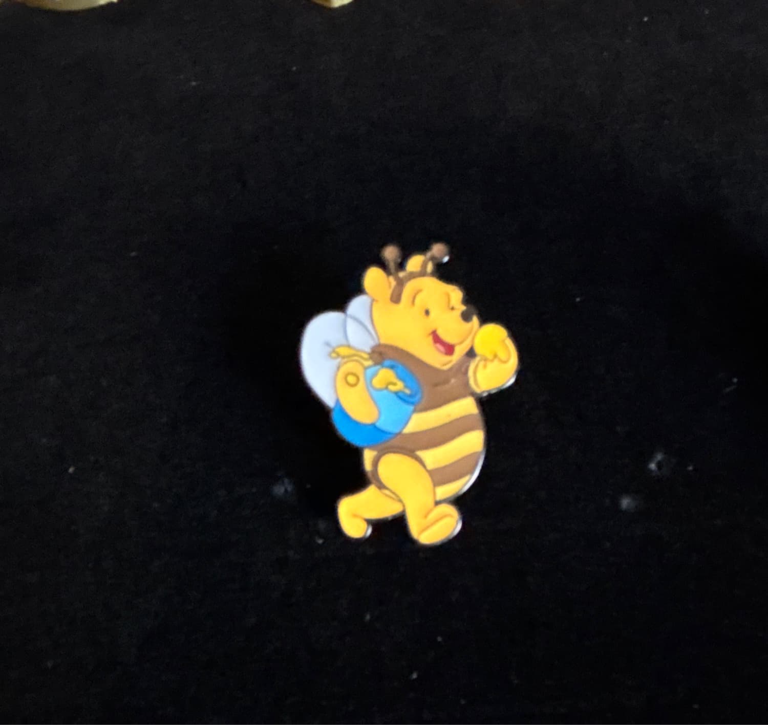 Pooh in Bee costume, Bee, and ''Hunny'' Pot front