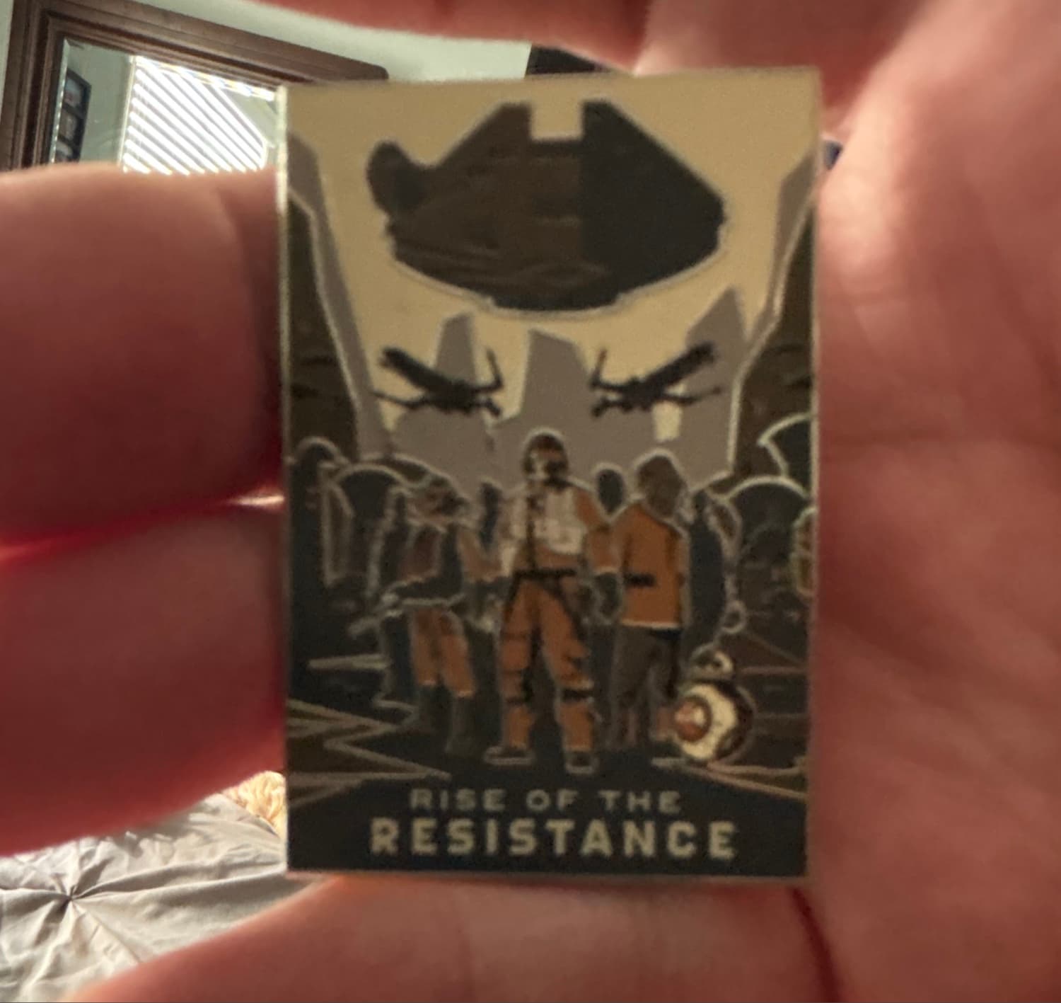 Star Wars: Rise of the Resistance Attraction Poster Pin with Rey, Finn, Poe, and BB-8 front