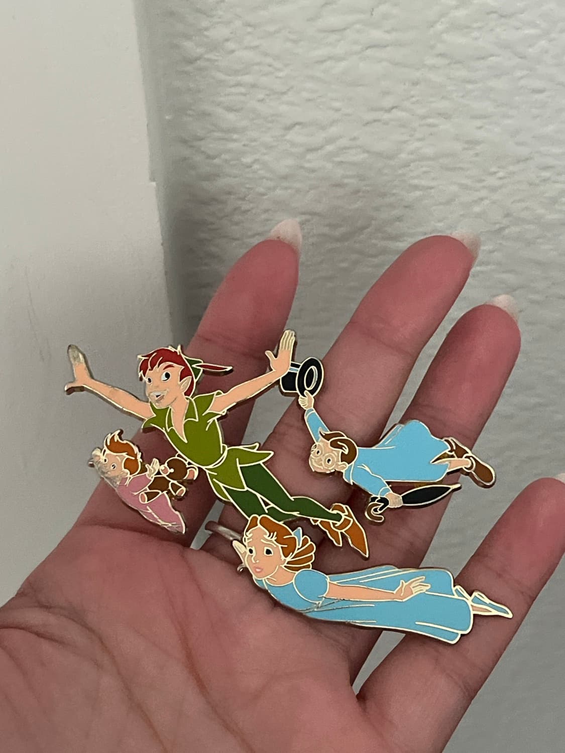 Loungefly Peter Pan 70th Anniversary You Can Fly 4-PC Pin Set (Peter Pan, Wendy, John, and Michael Darling) front