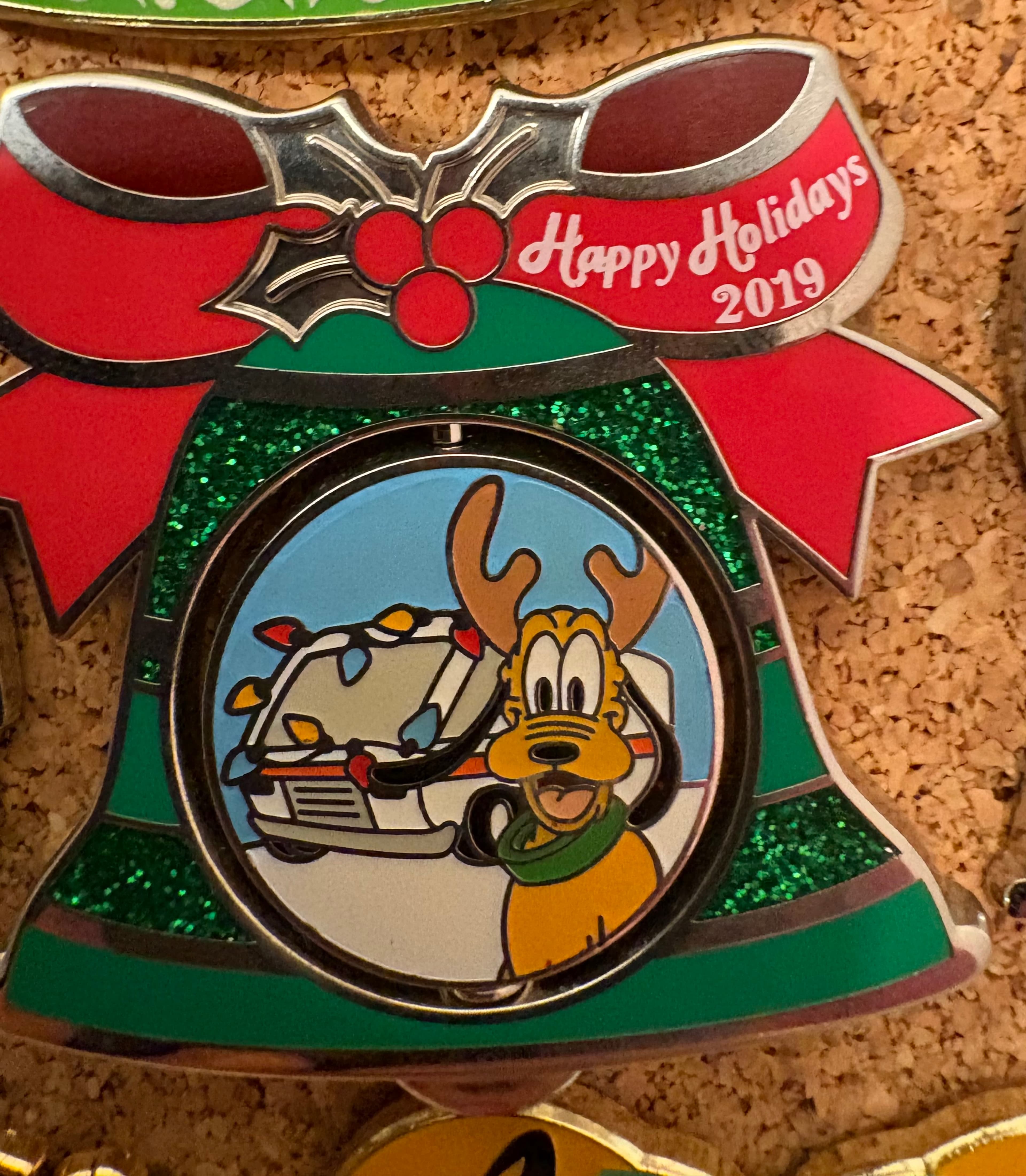 Pluto with Camper Happy Holidays 2019 Spinning Bell Pin front