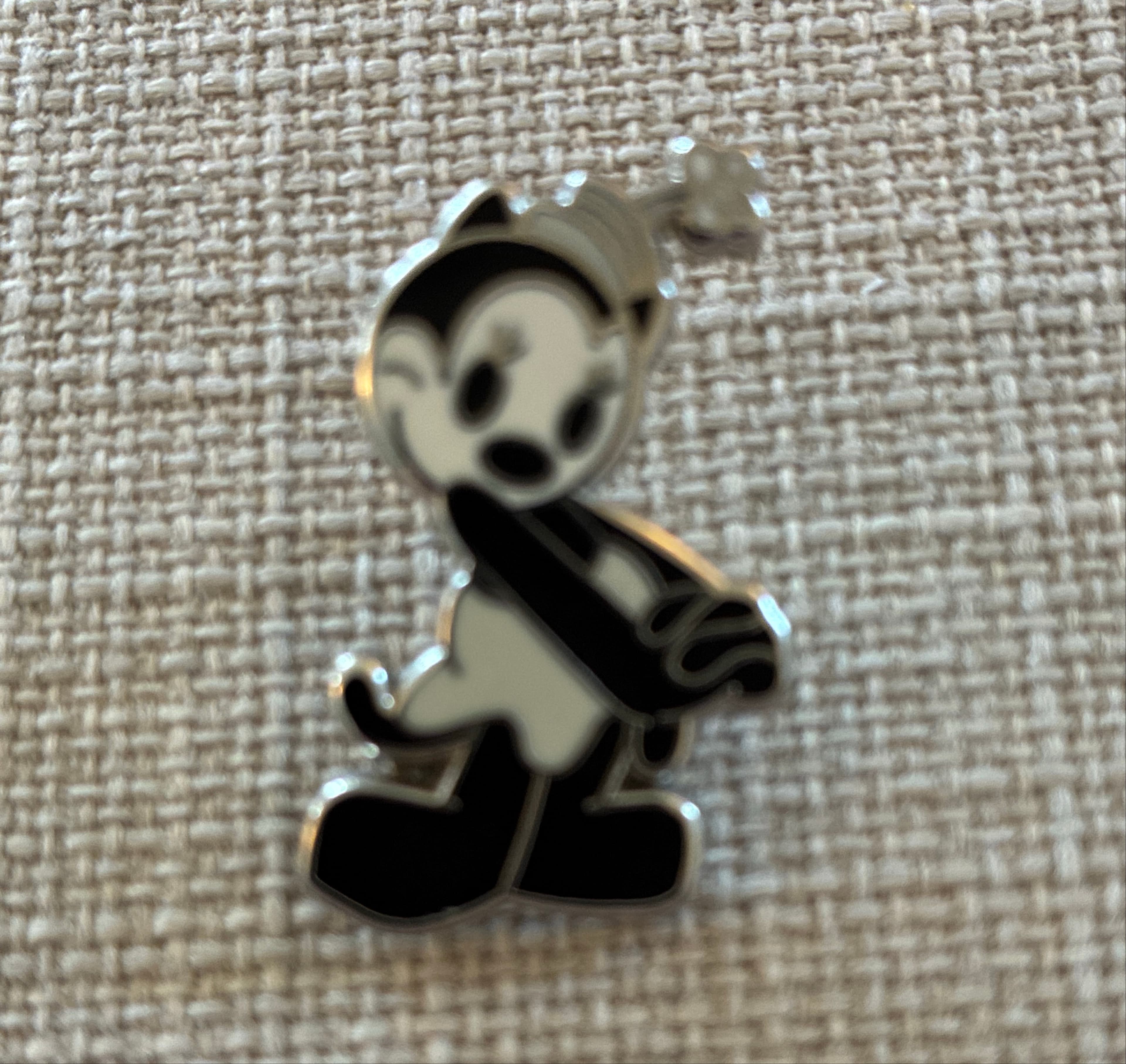 Oswald the Lucky Rabbit Thoughtful with Rolled Document Pin front