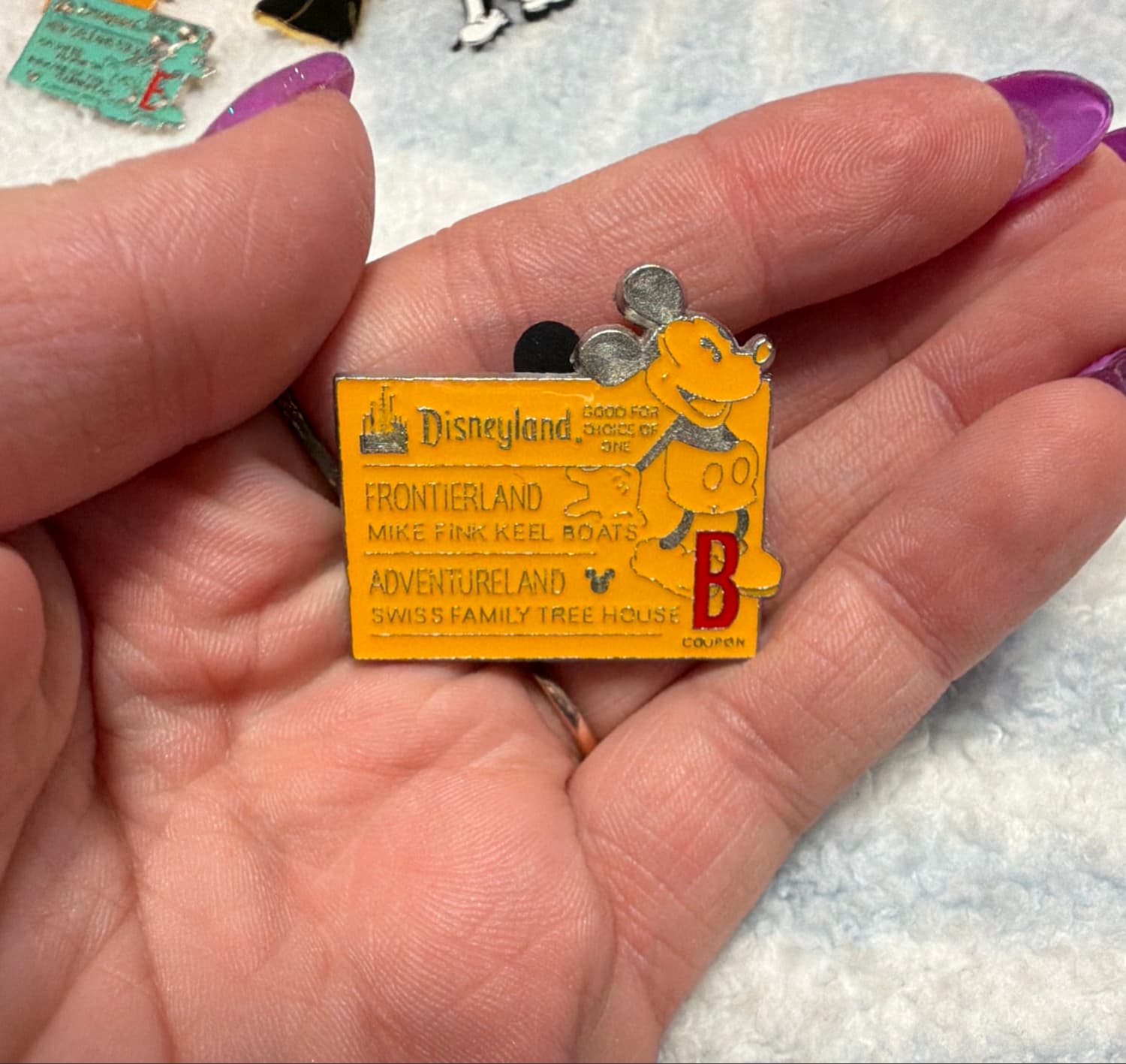 Mickey Mouse 'B' Frontierland / Adventureland Ticket Pin front