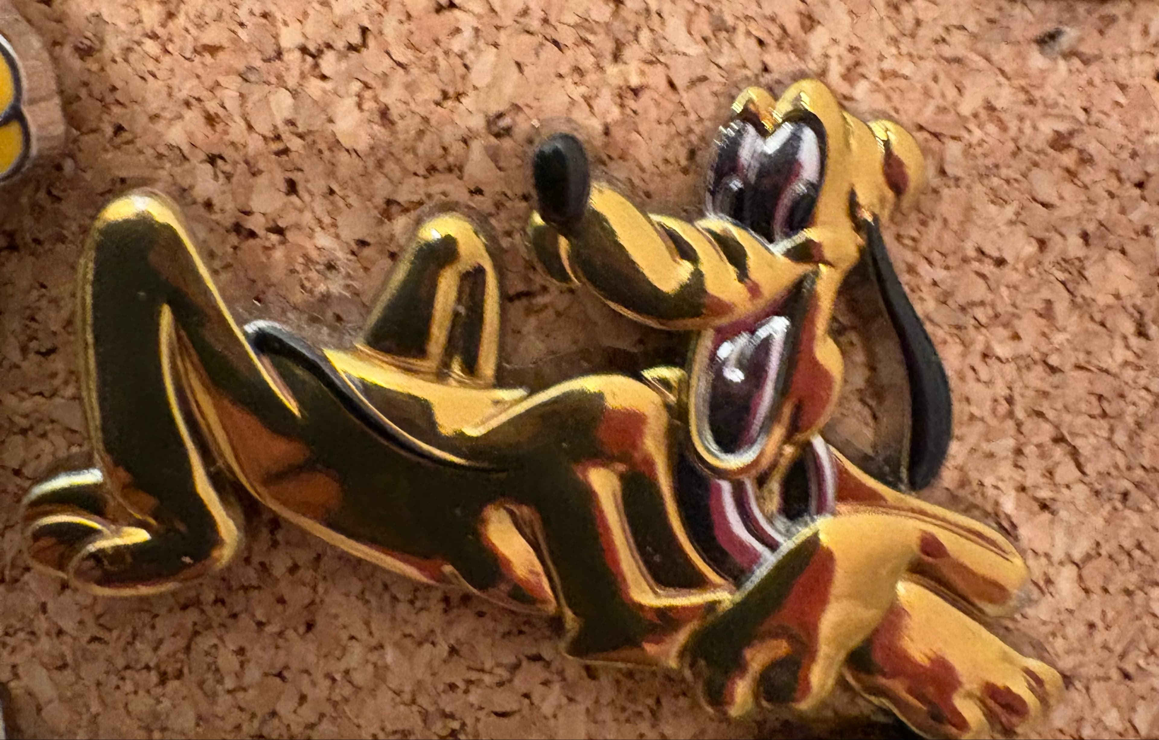Pluto Sculpted Metallic Yellow Pin front