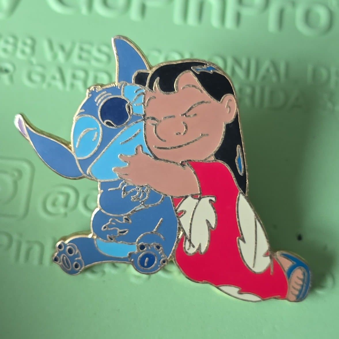 Lilo Hugging Stitch front