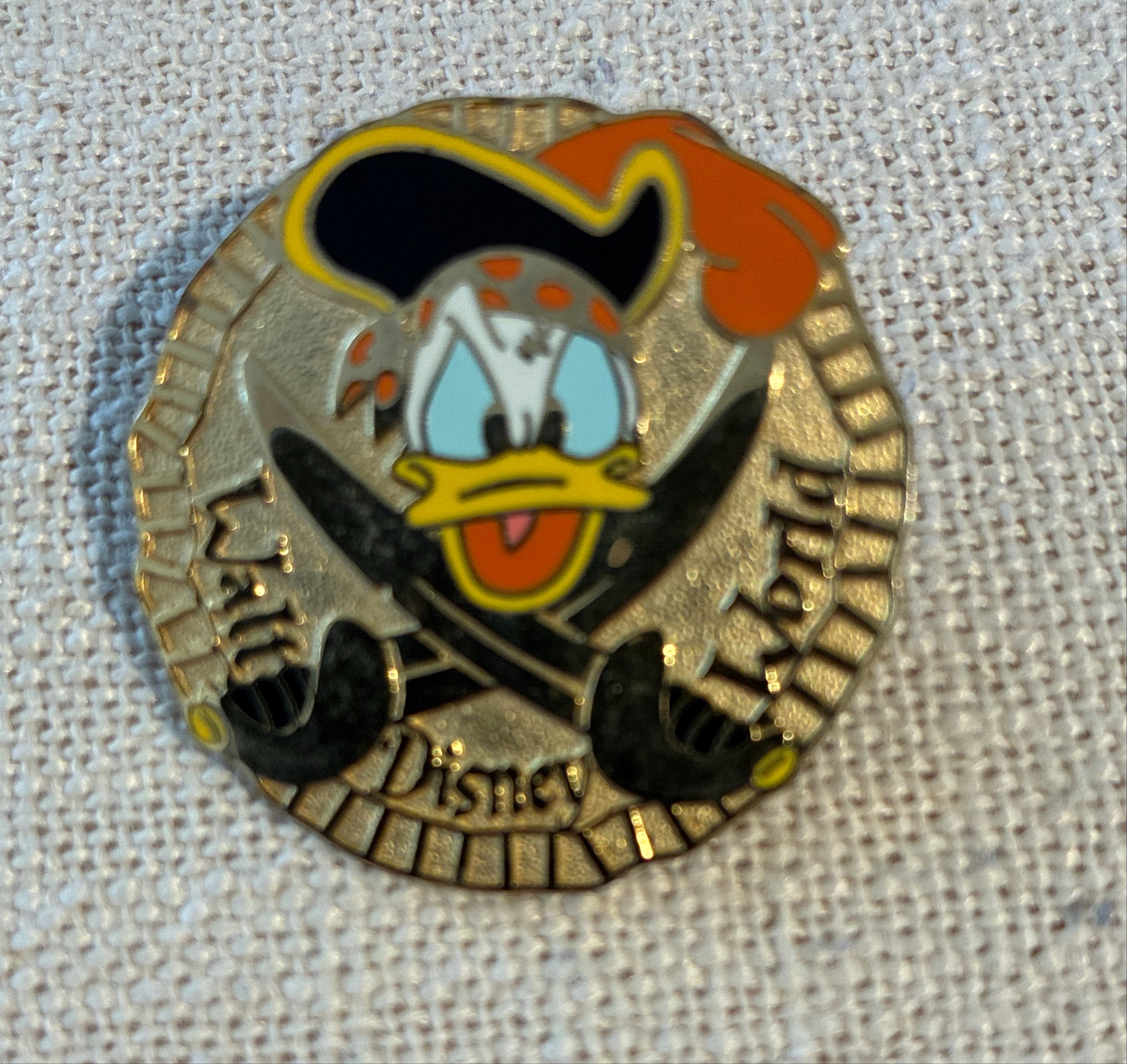 Donald Duck Pirate Gold Coin with Crossed Swords front