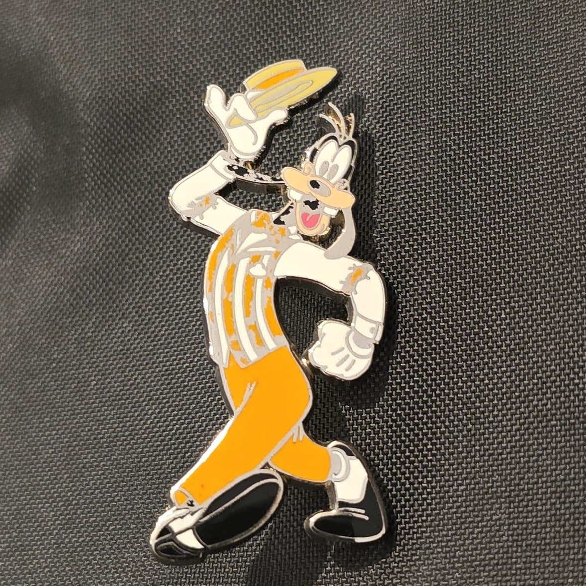 Goofy Wearing an Orange Striped Vest and a Straw Hat front