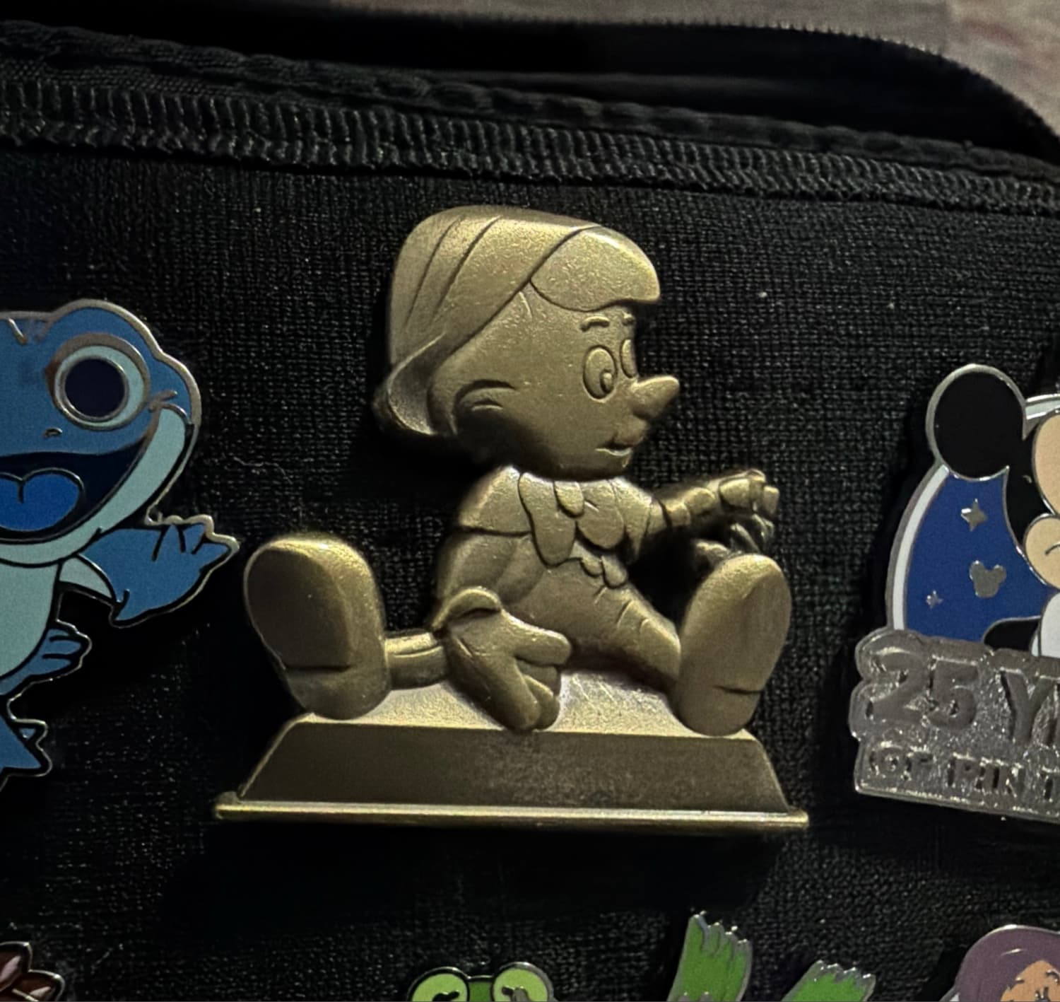 Pinocchio Bronze Statue Annual Passholder Pin front