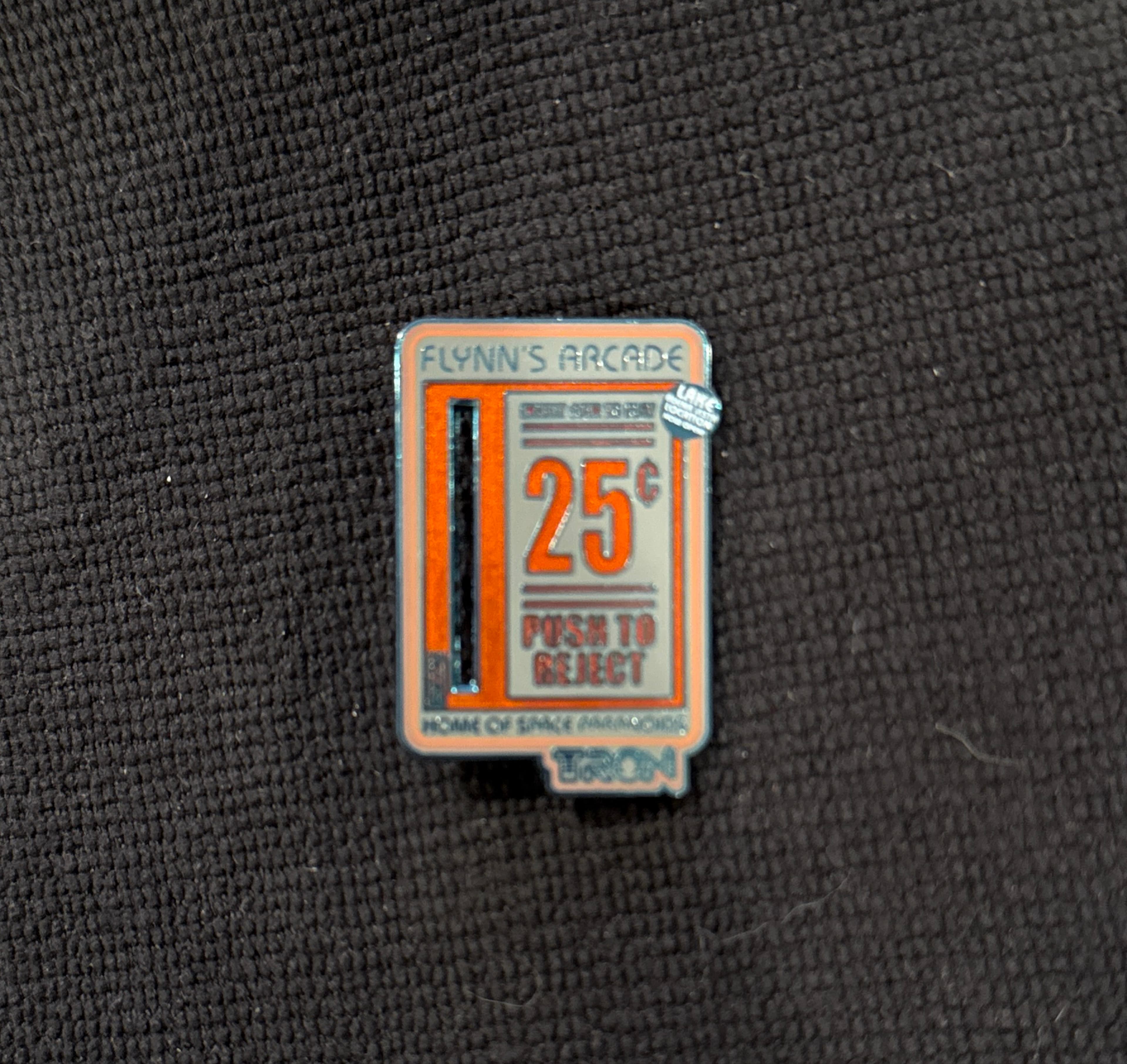 Flynn's Arcade Coin Slot - TRON Lightcycle Run - Home of Space Paranoids - 25 Cents Push to Reject front