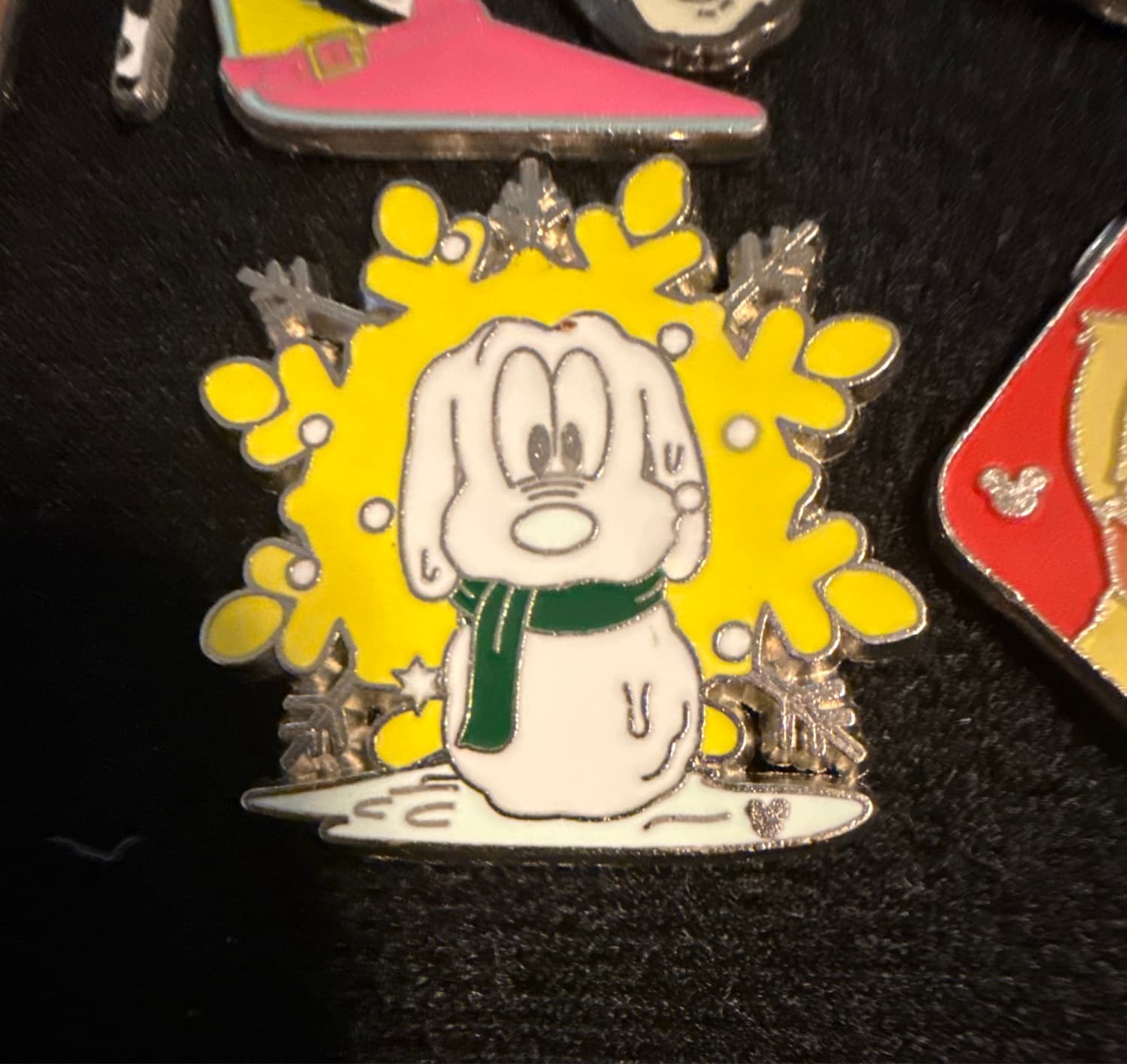 Pluto Snowman on Yellow Snowflake Hidden Mickey Pin front